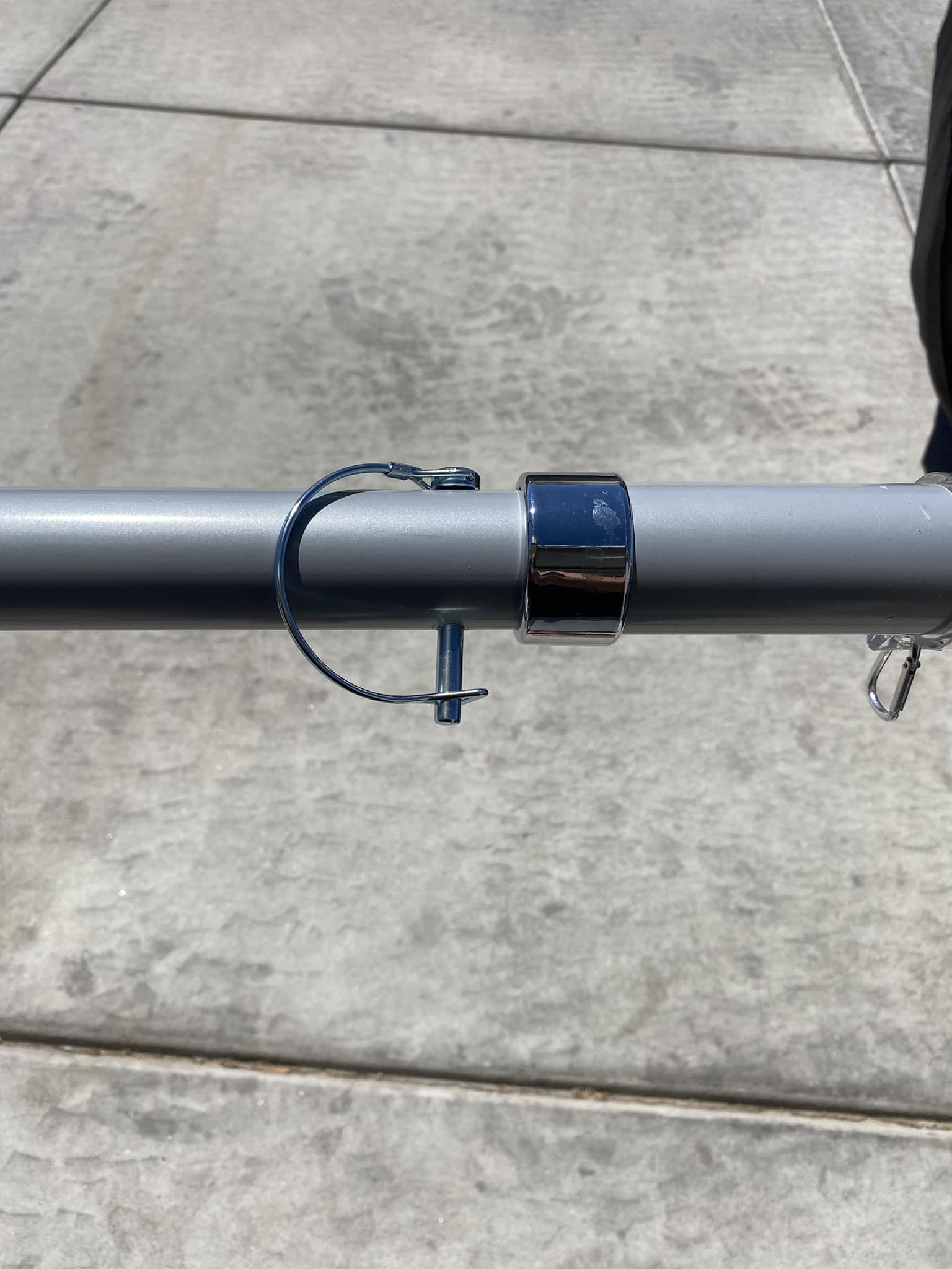 Drilled holes to fix Harbor Freight flag pole twist lock