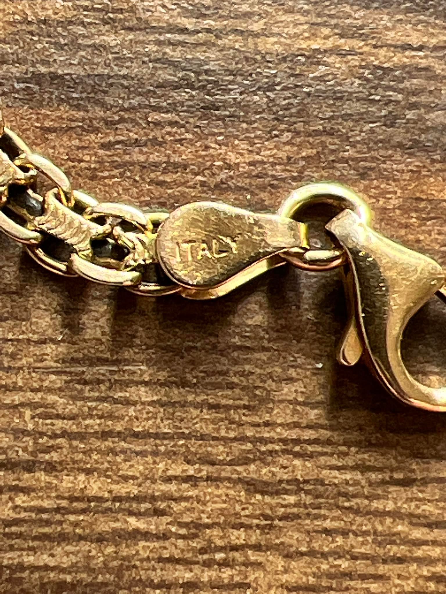 14K ITALY 1260 AR ゴールドピアス What does 14k Italy YY jewelry marking mean?