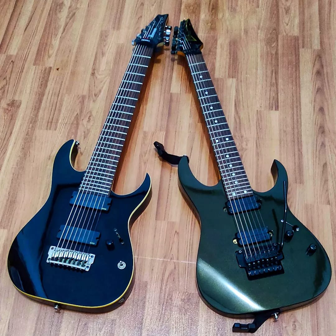 Should I buy a used Ibanez Prestige RG2550Z-WPM or a new guitar
