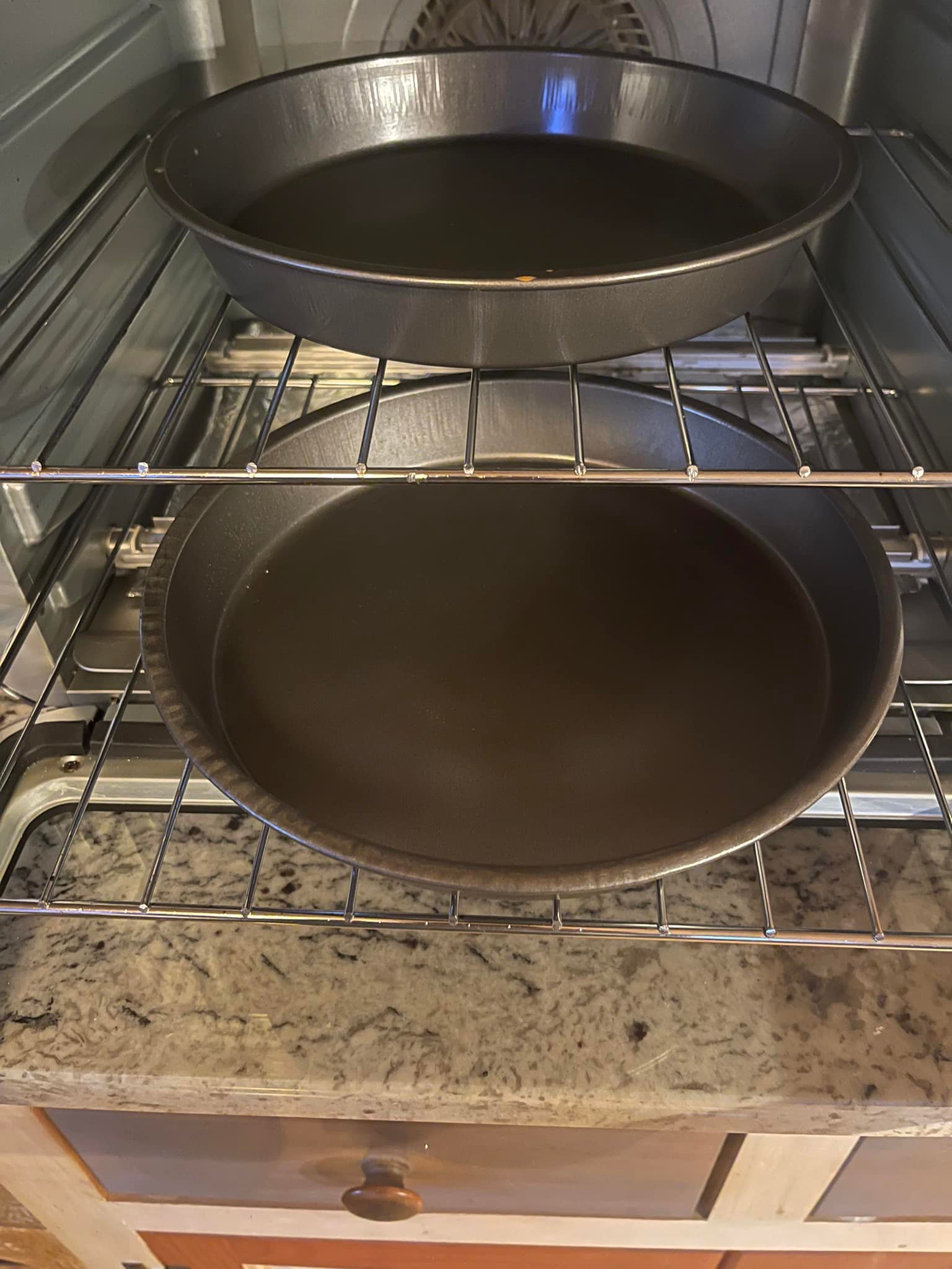 Mary - Two 9-inch round cake pans fit just fine. | Facebook