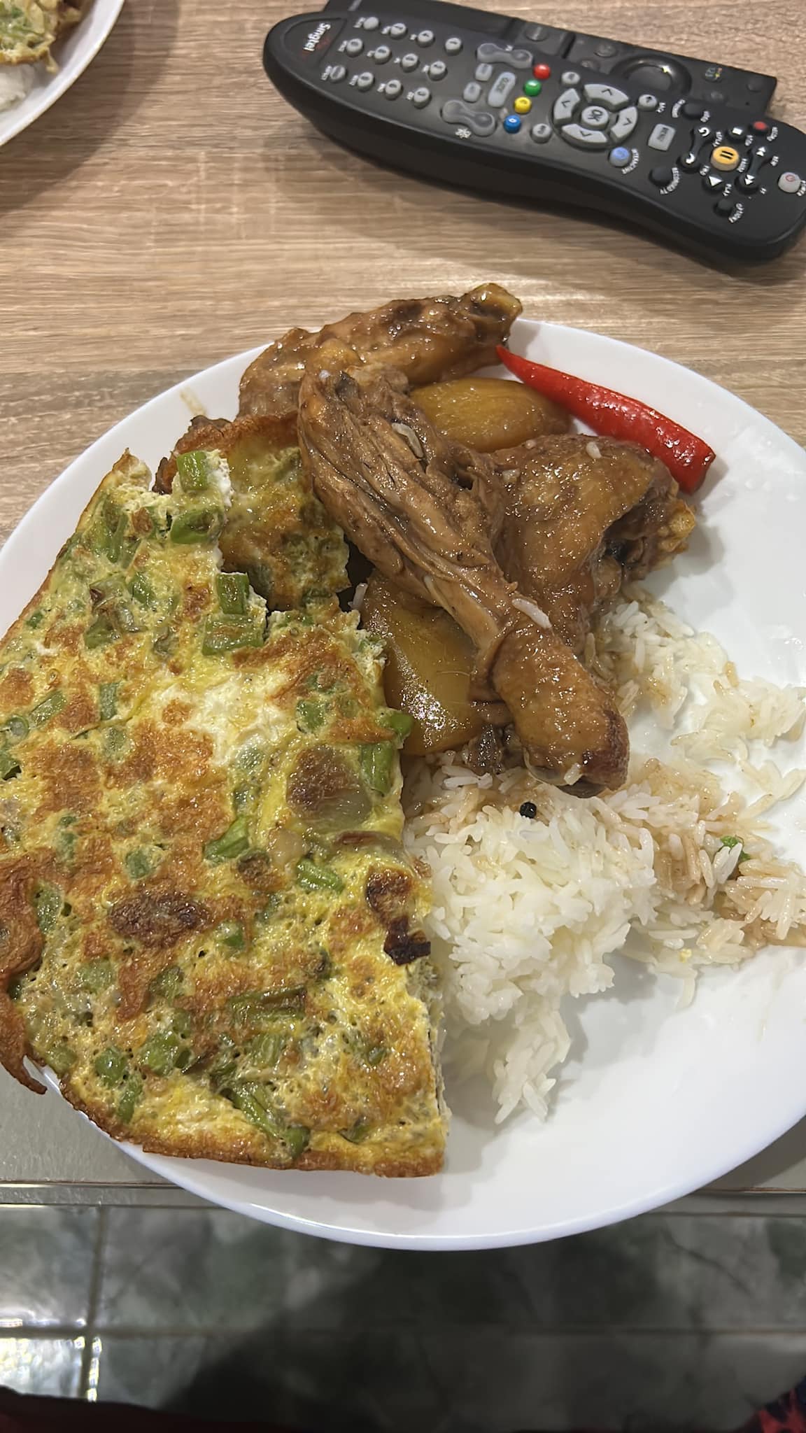 Made chicken adobo (Filipino style soy sauce chicken) and green