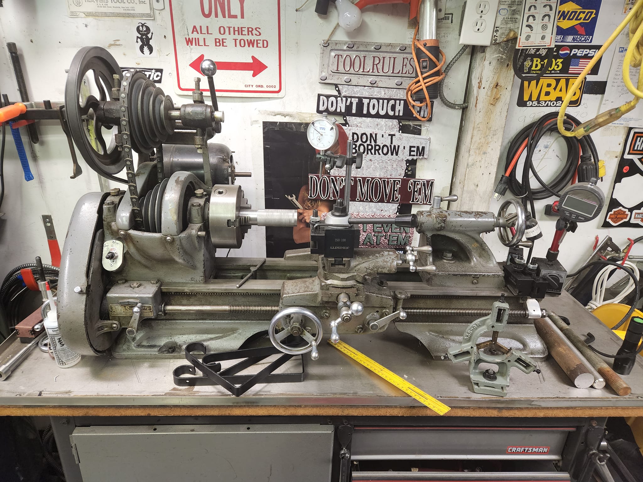 What is the vintage and model number of the Atlas lathe?