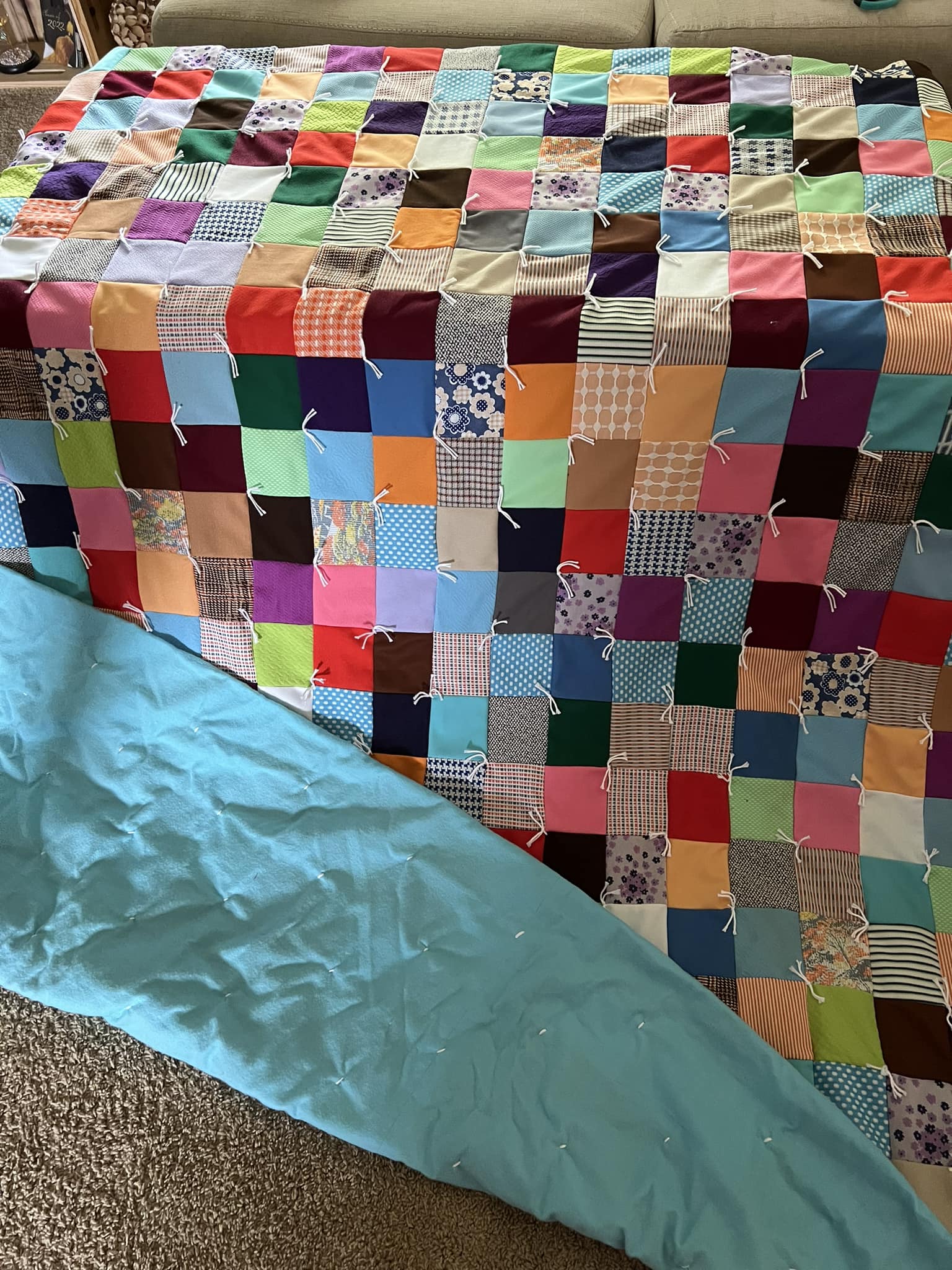 How to finish a double knit quilt started by great grandmother?