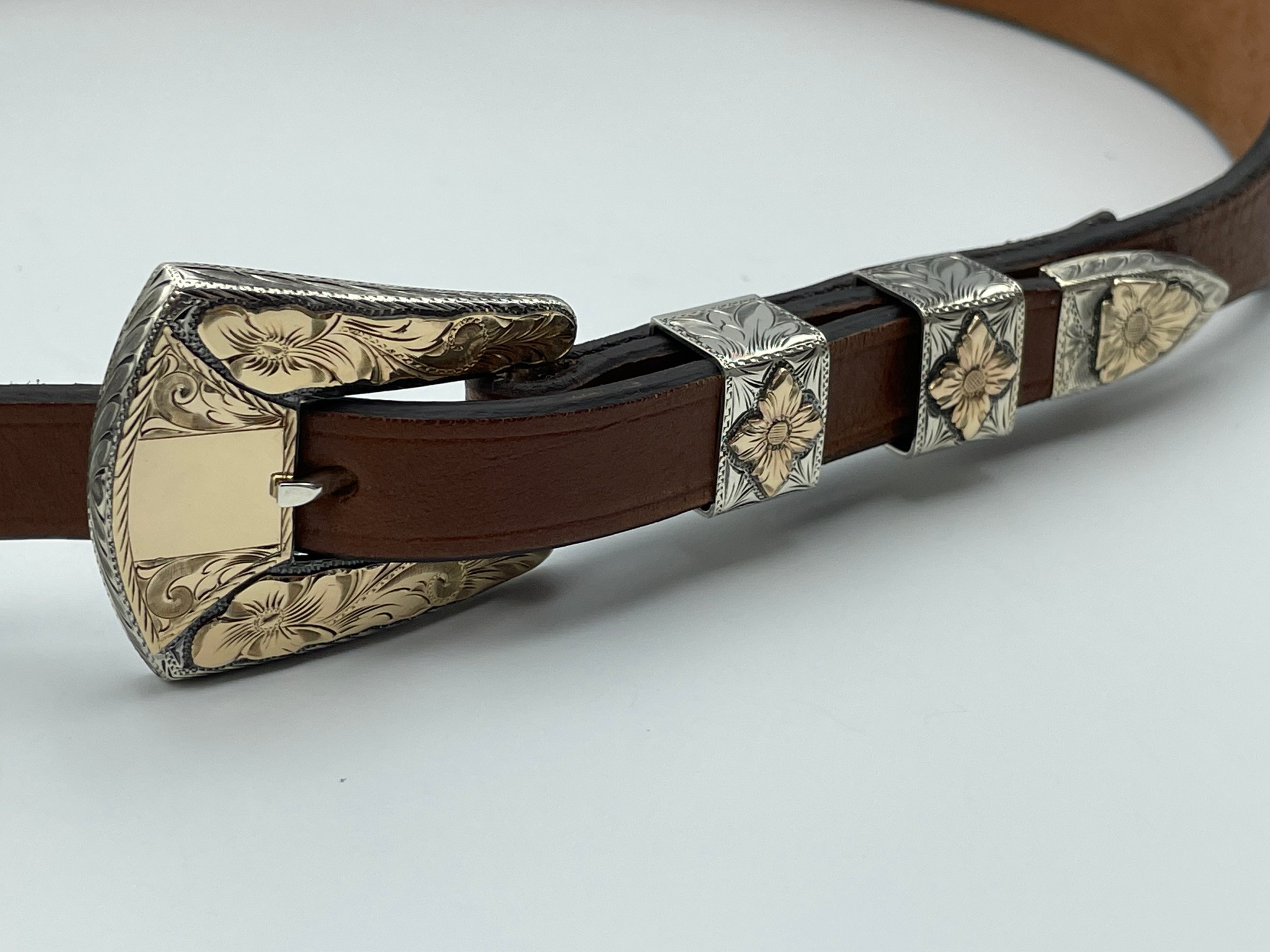 What is this 1940s 935 sterling silver 10k gold ranger belt buckle 