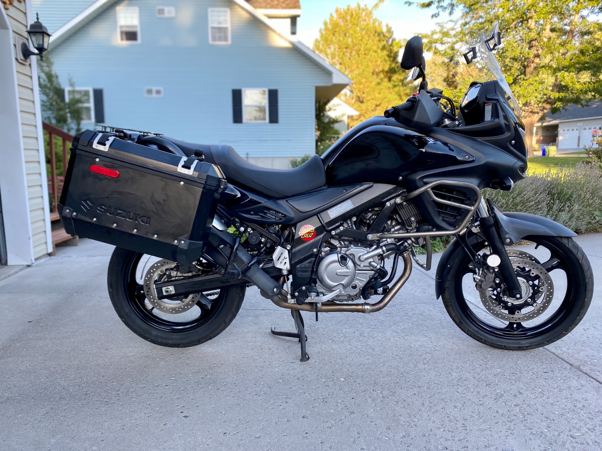 Low-mileage CFMOTO 650 Adventura motorcycle in blue and silver