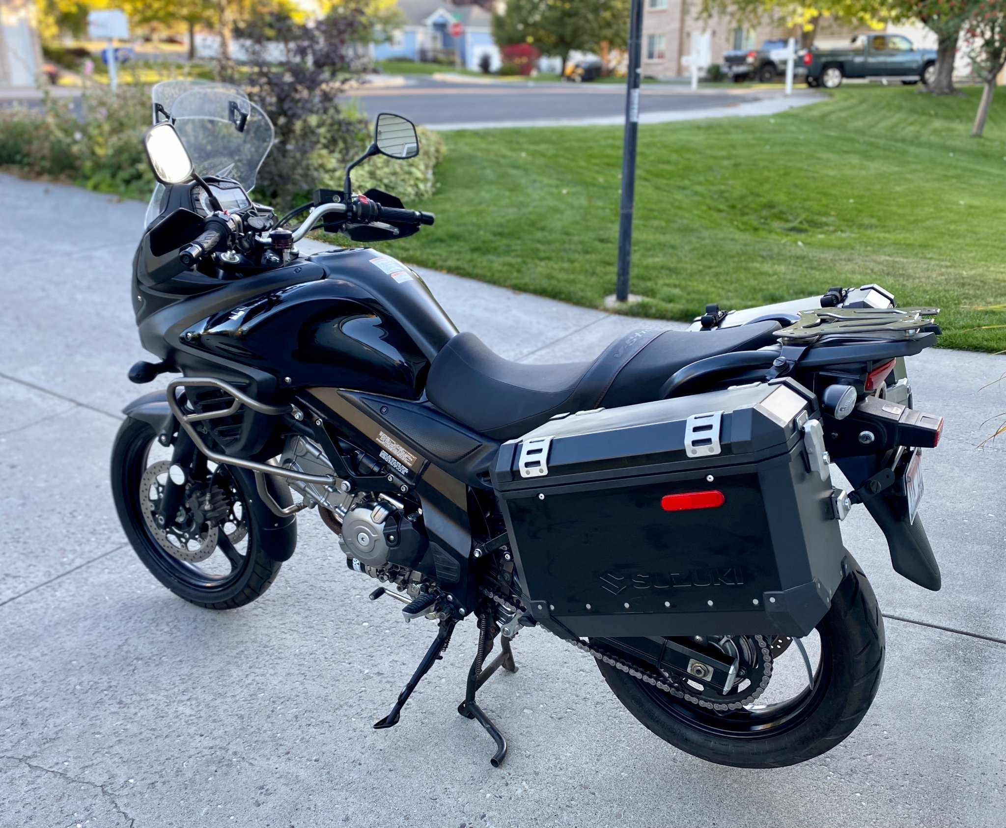 Low-mileage CFMOTO 650 Adventura motorcycle in blue and silver