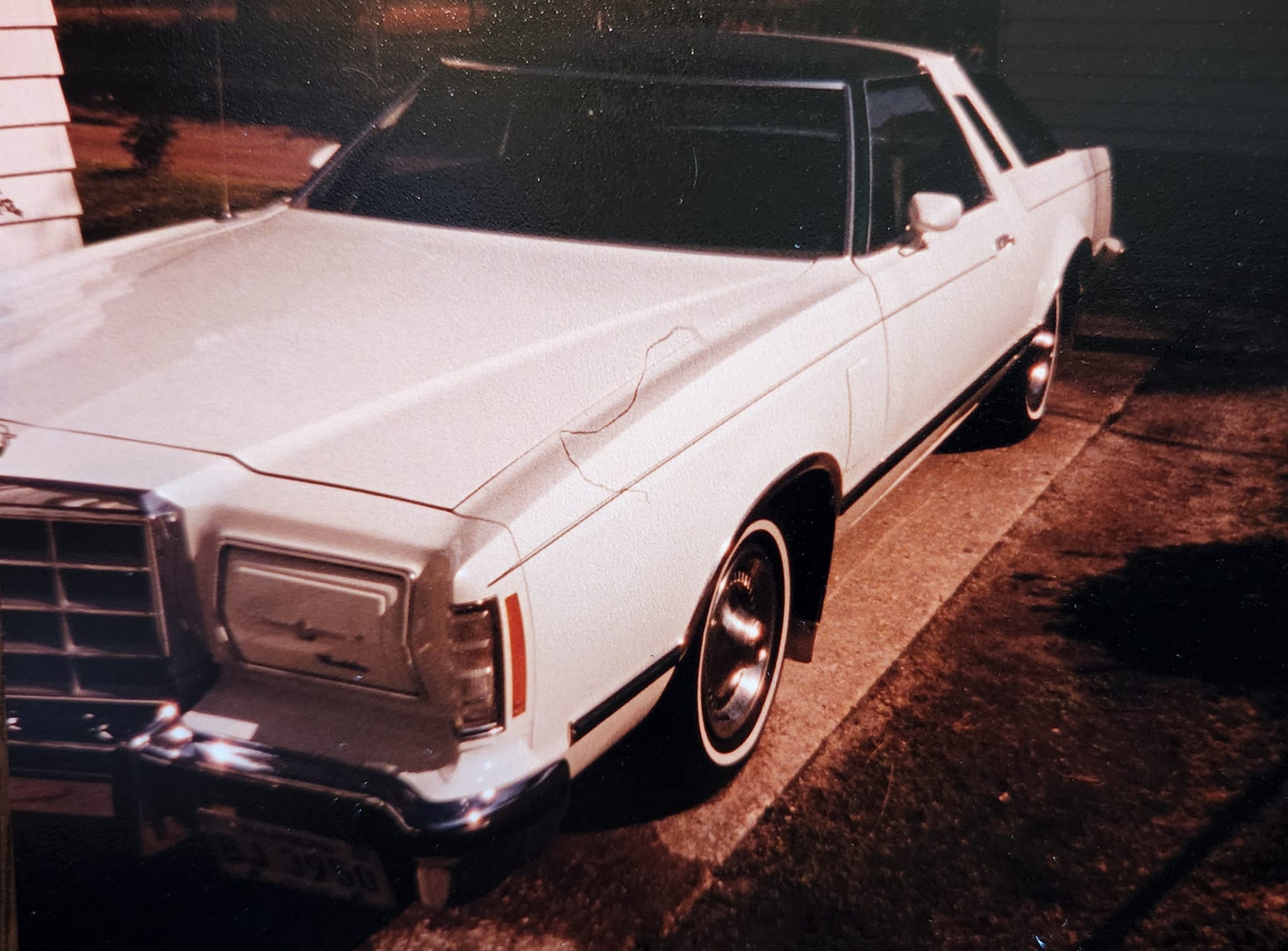 Polar white '79 Ford Thunderbird with dark jade accents