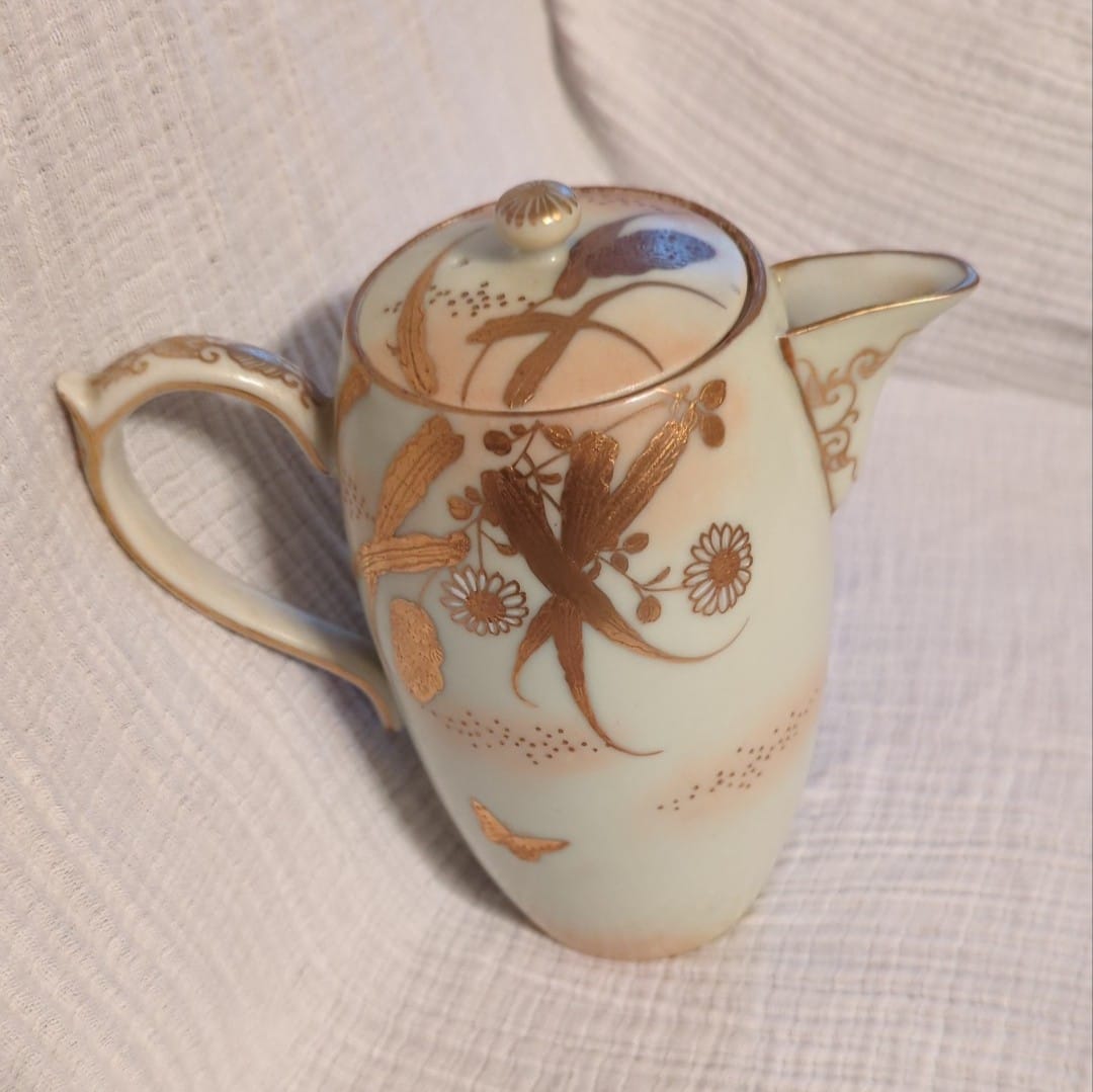 Japanese markings on cast iron tea pot