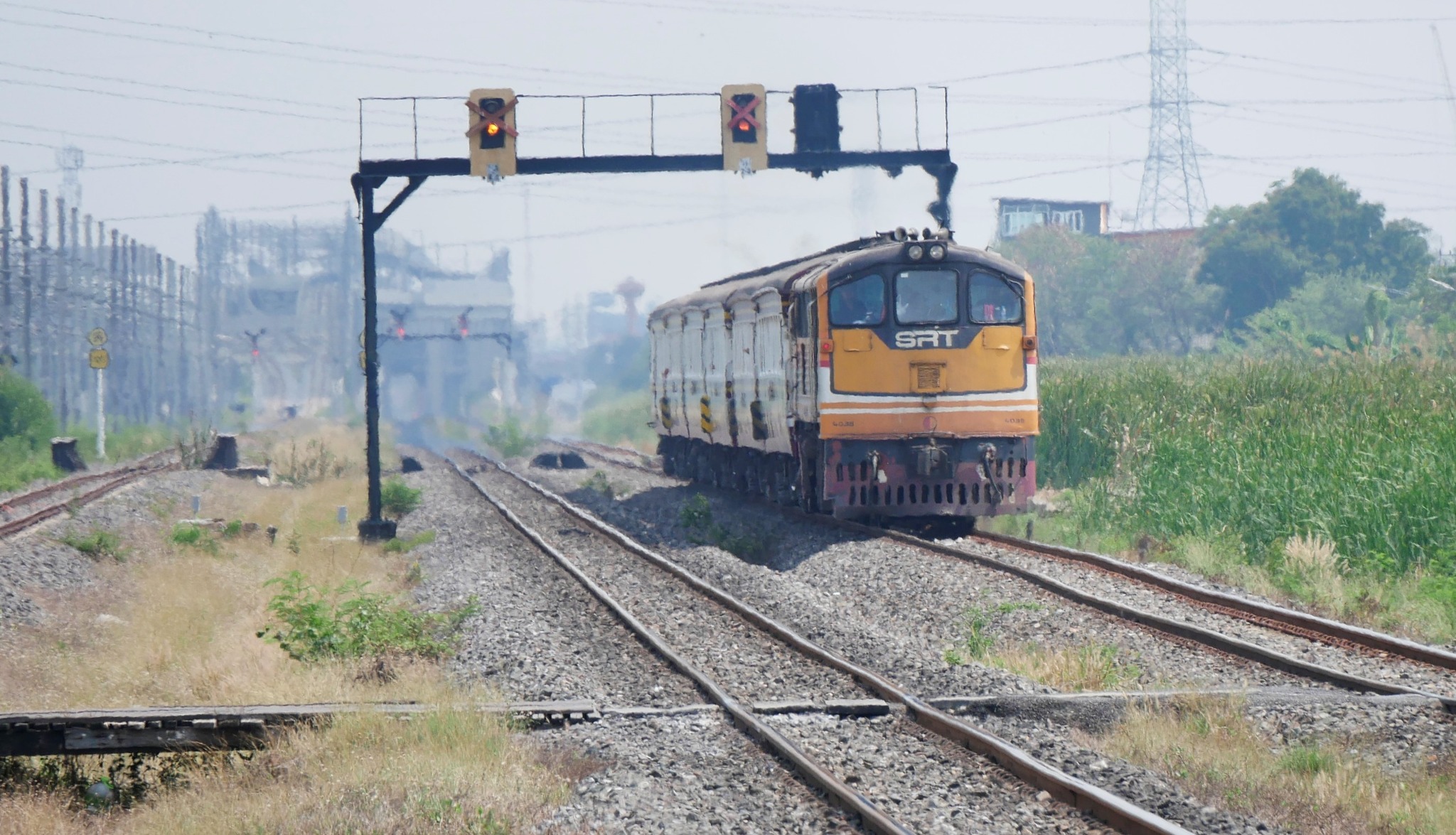GE4018 and Alsthom 4132 at Nam Tok station.