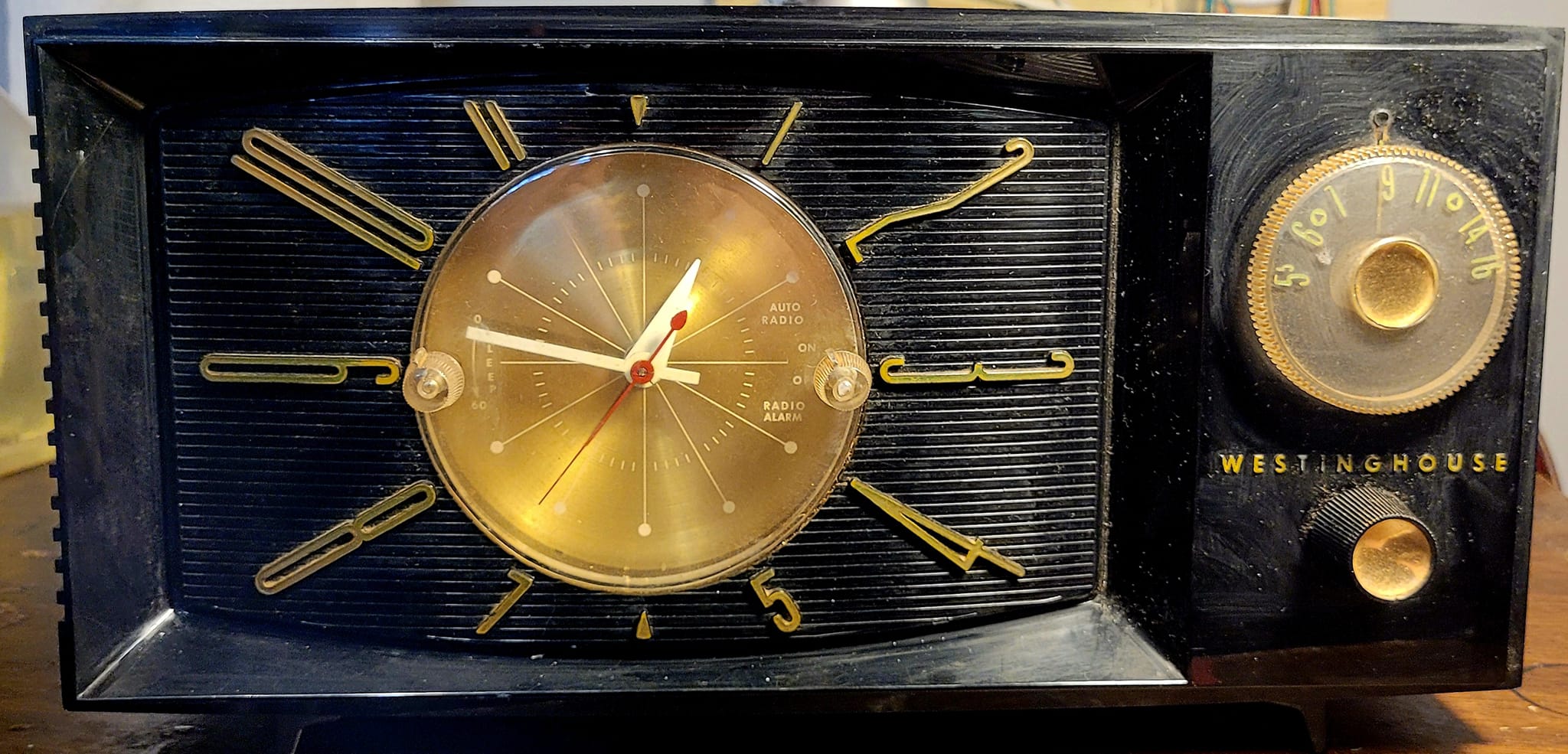 Restored 1955 Westinghouse clock radio with onyx black case