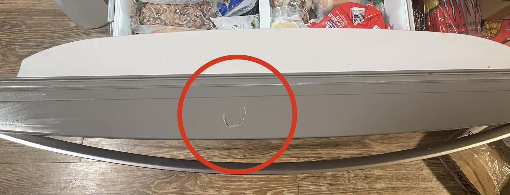 Whirlpool WRF535SWHZ freezer door replacement part needed