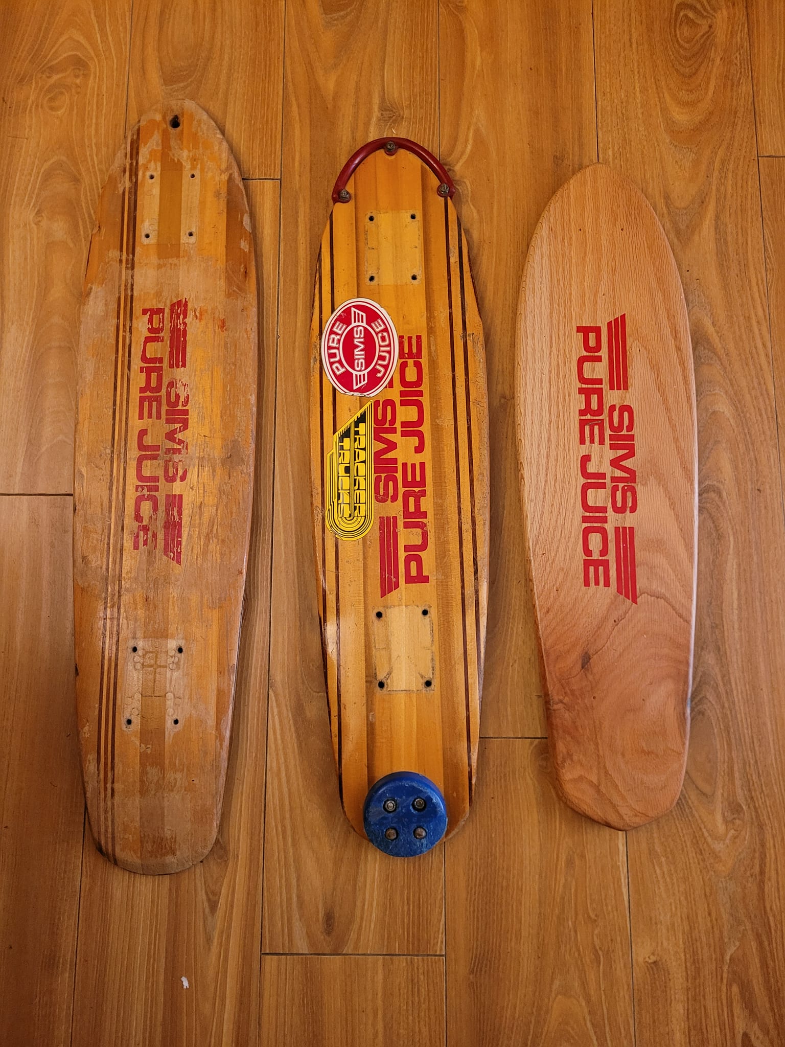1970's Sims skateboard with tracker trucks on display