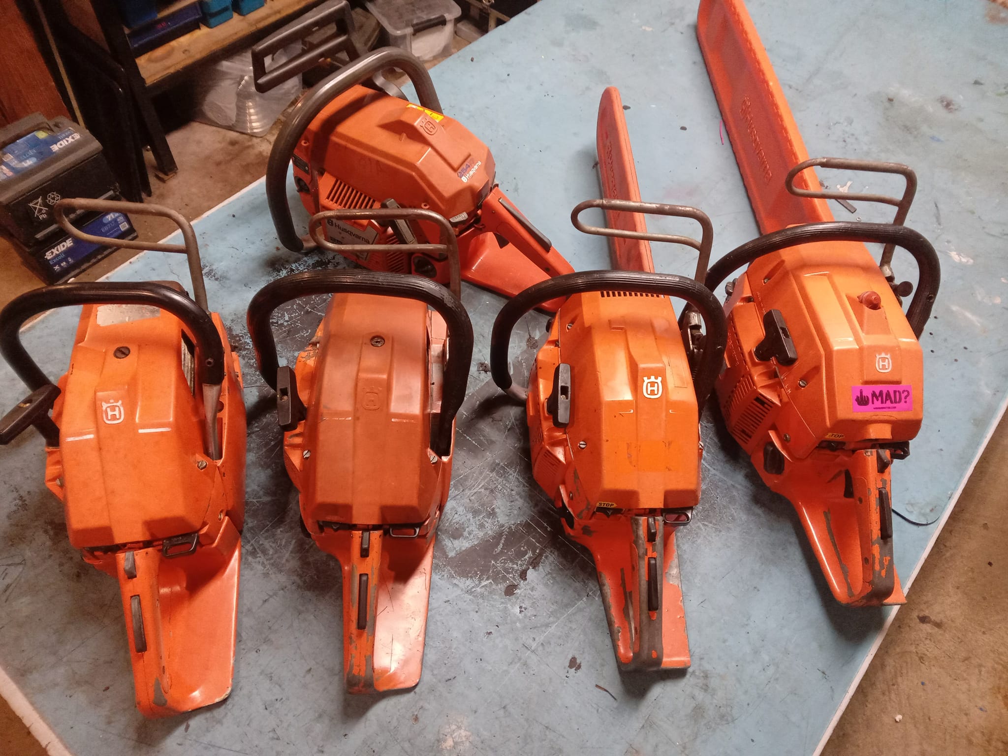 Husqvarna chain saw collection with 254, 61, 162, and 266 models
