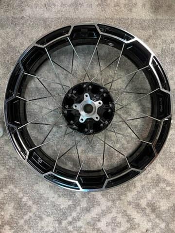 Combo cast laced 21 in. front wheel and 18 inch rear wheel for sale