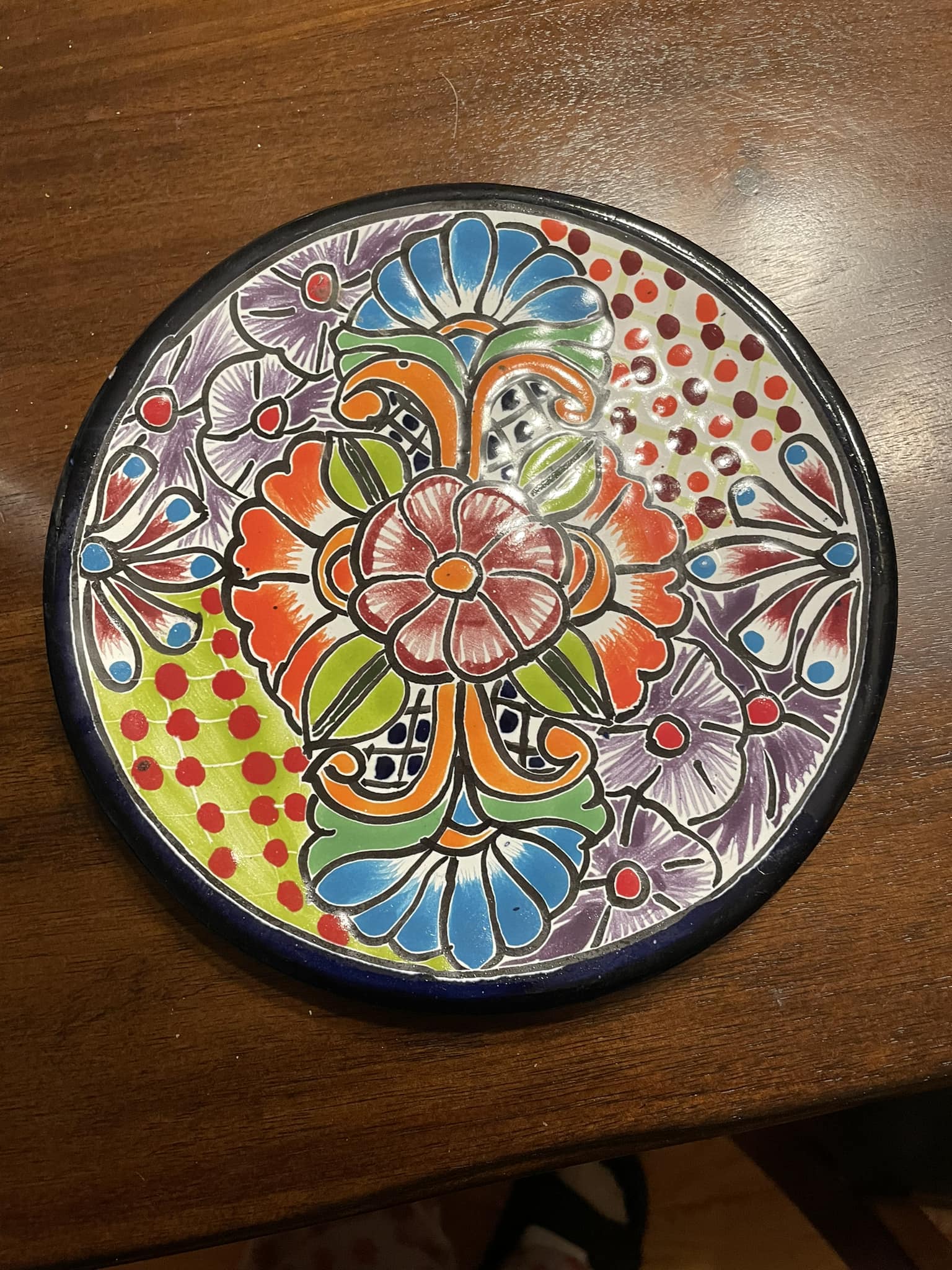 I use broken vintage Mexican pottery and Mexican folk art in my 