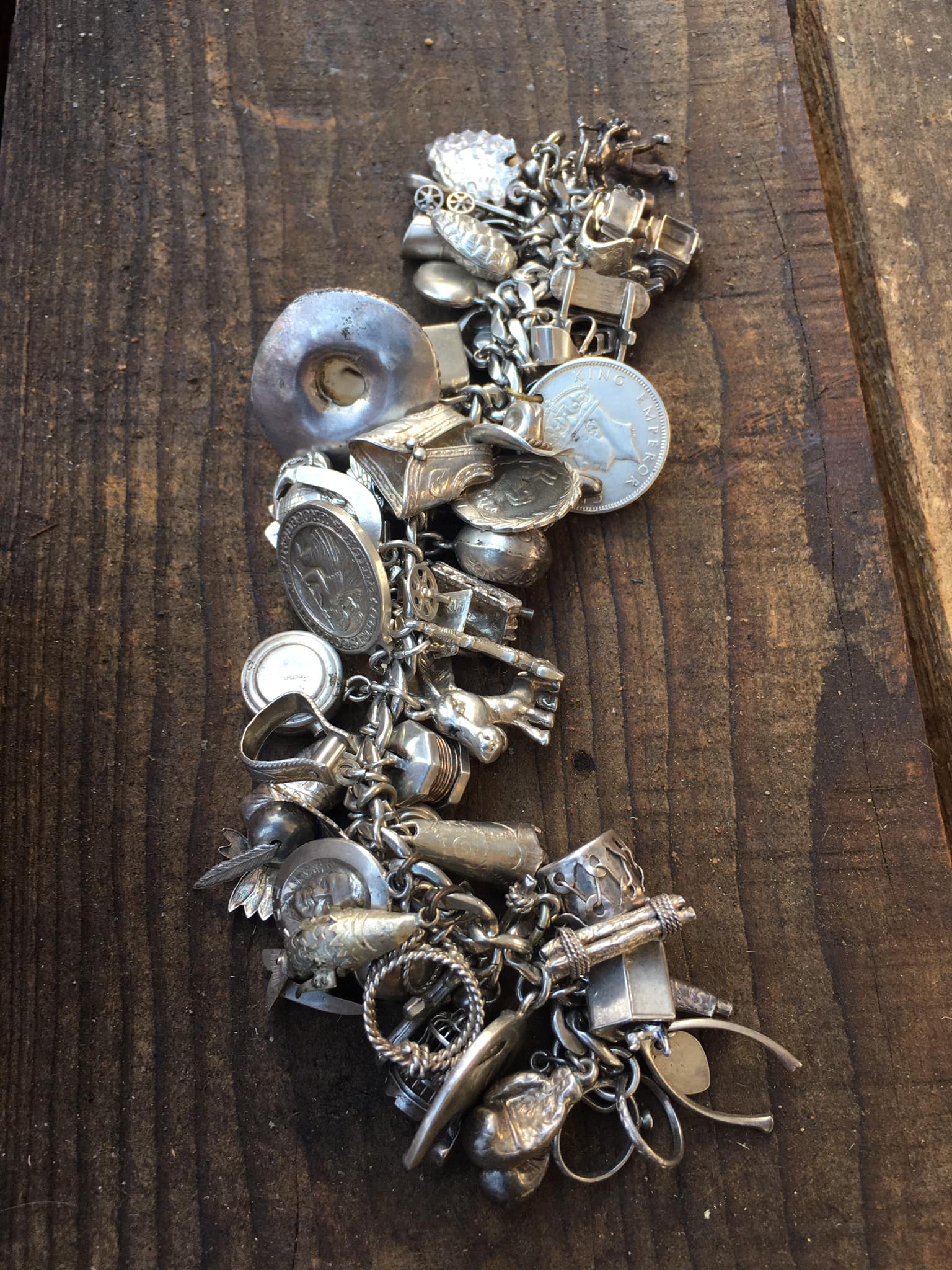 Vintage sterling silver charm bracelet with 60 charms