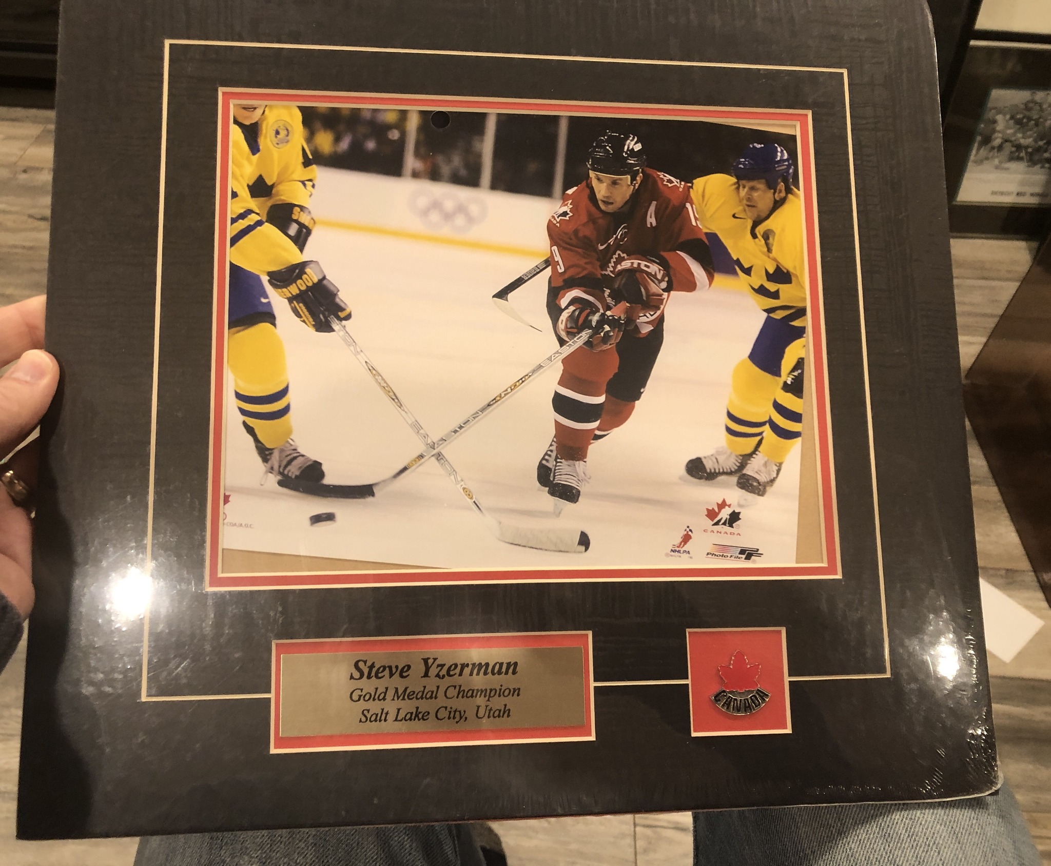 $25 USD plus shipping. Nice pic of Steve Yzerman, along with a  display picture 1