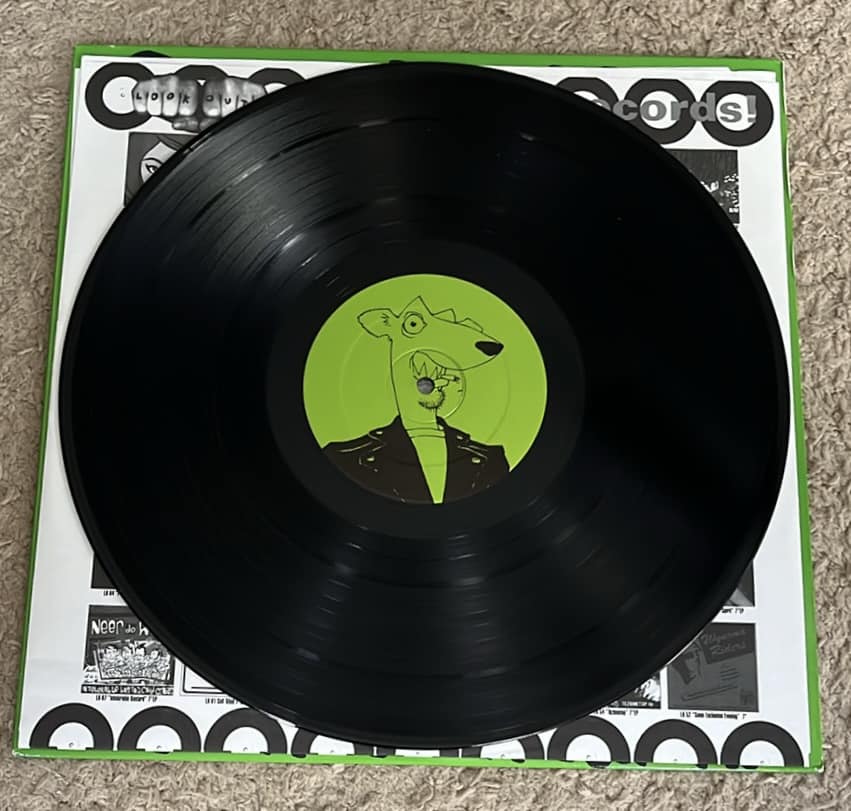 Screeching Weasel's Boogadaboogadaboogada! 2020 remaster on green