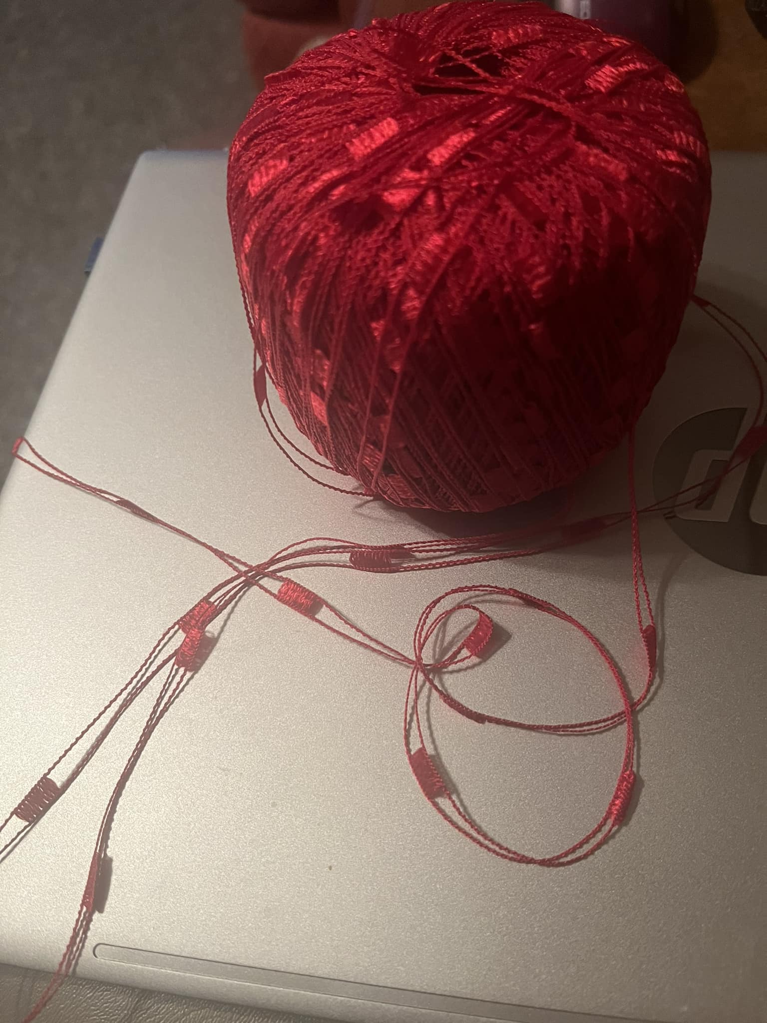 Ribbon section of Michaels. It's actually machine knit but looks