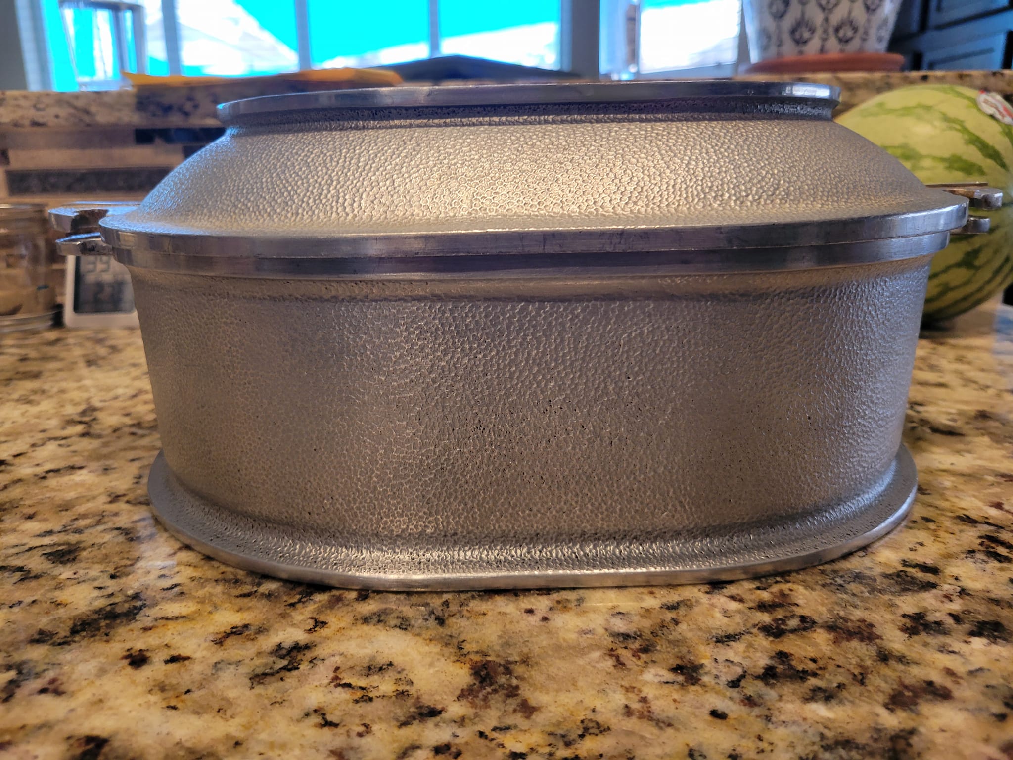 Is vintage hammered aluminum bread baker safe for sourdough?