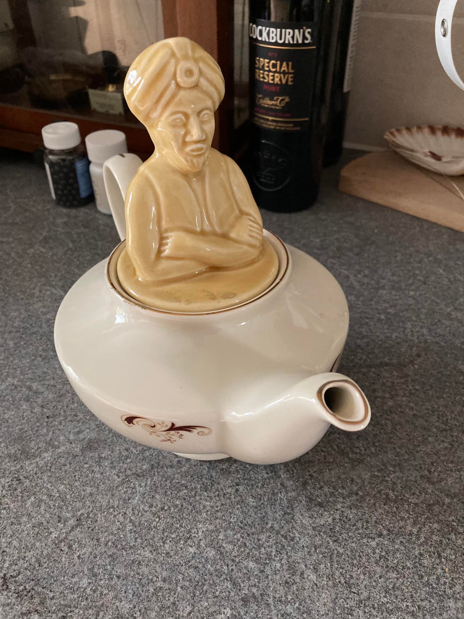 Thrift shop teapot possibly holding a genie