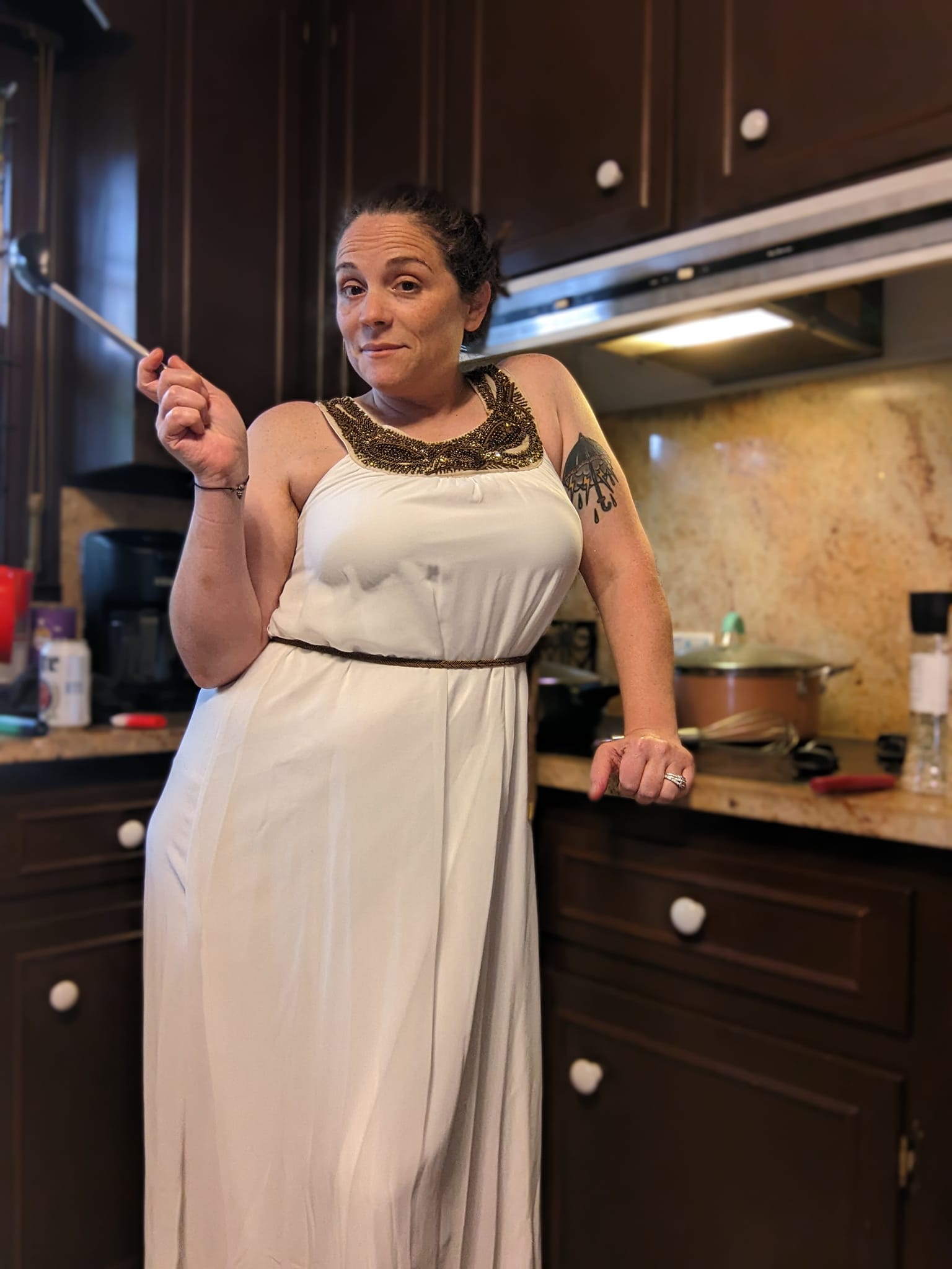 My mom brings me a random costume dress while I'm cooking. I put it on to finish dinner. No one bats an eye