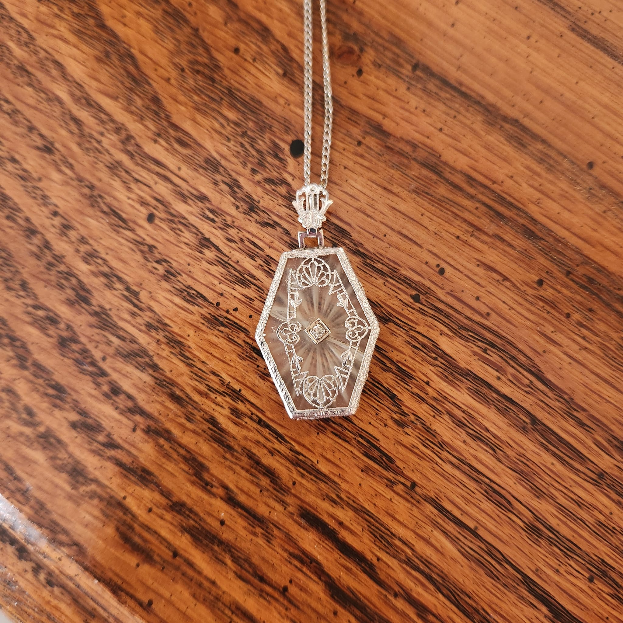 What information is available about this vintage camphor glass 