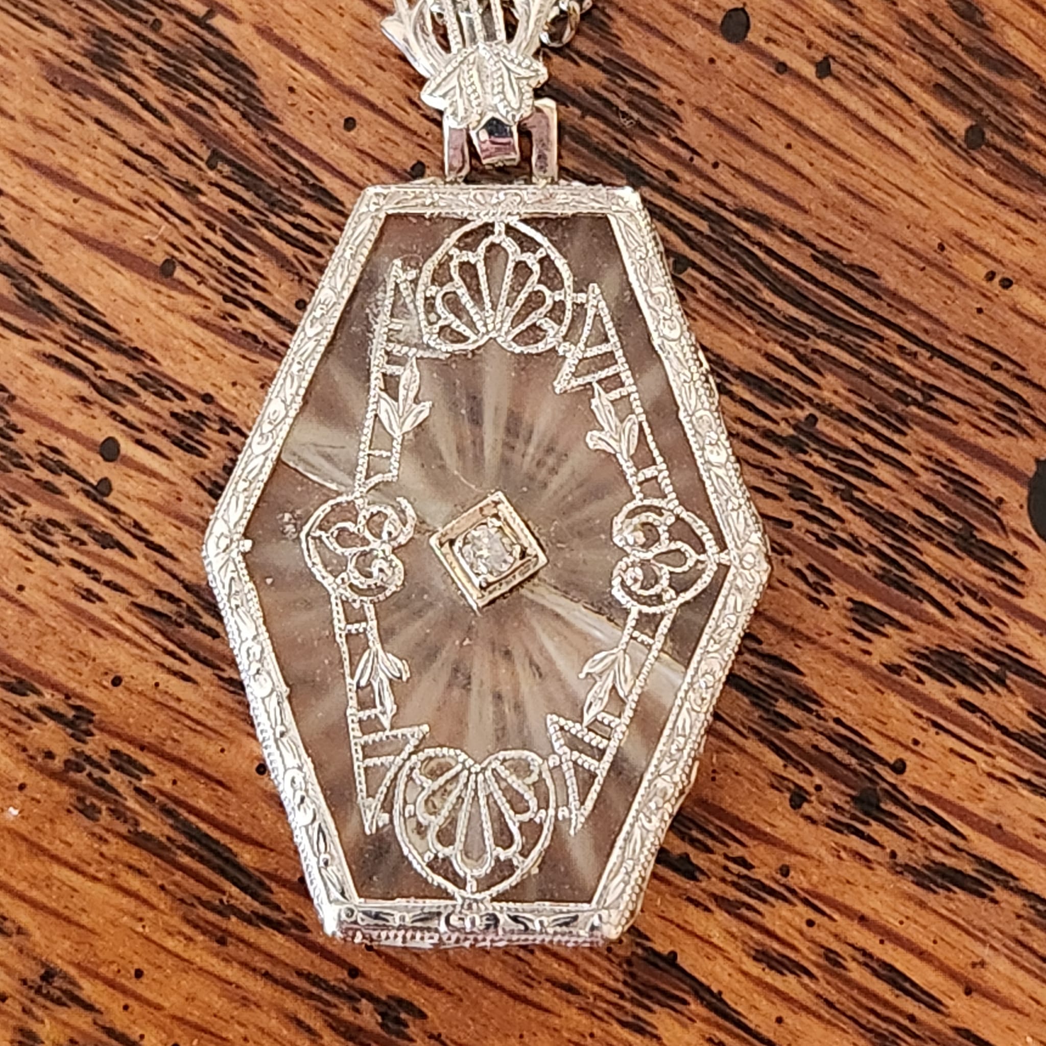 What information is available about this vintage camphor glass 