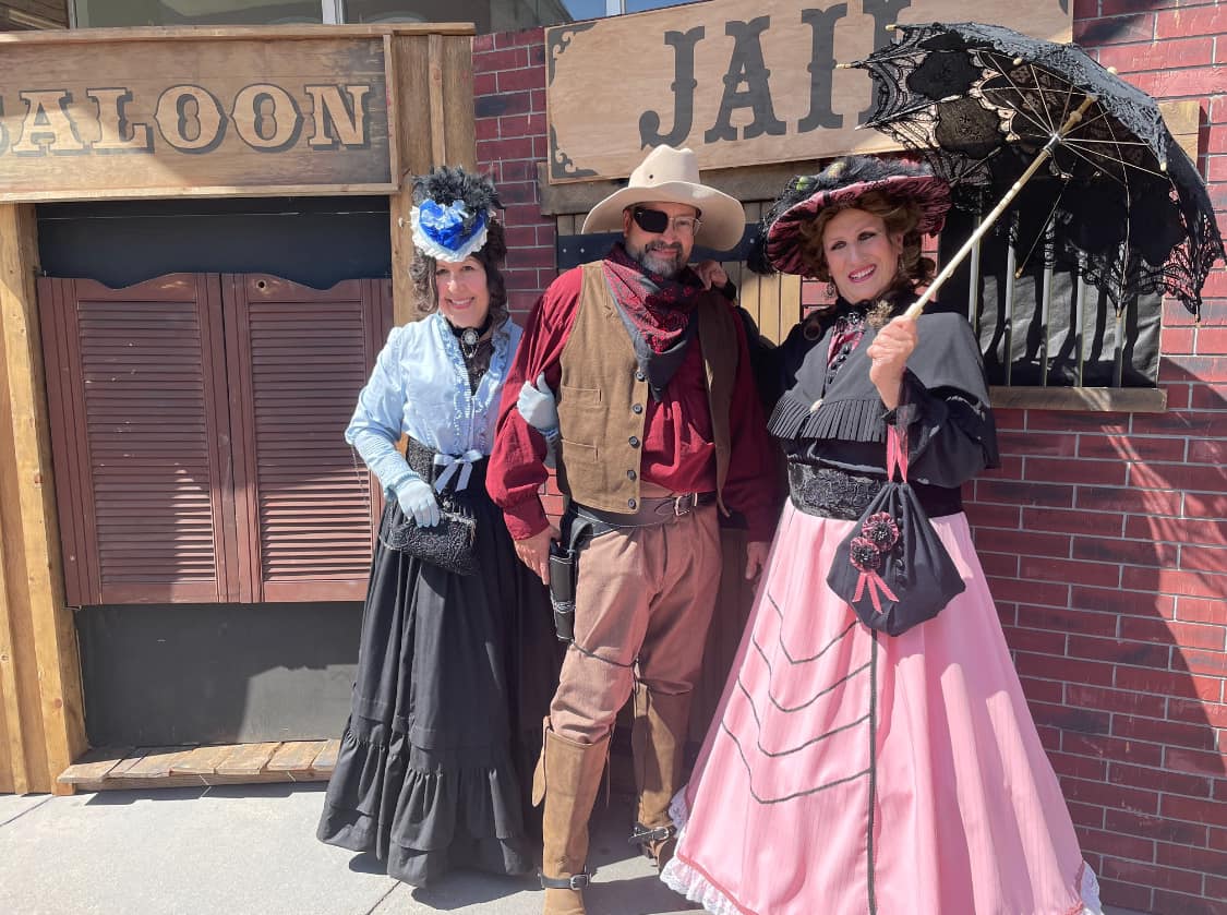 gold rush era dress Victorian-era costume clubs attend Days in Yreka, California ravenna-navy-knit-mini-dress