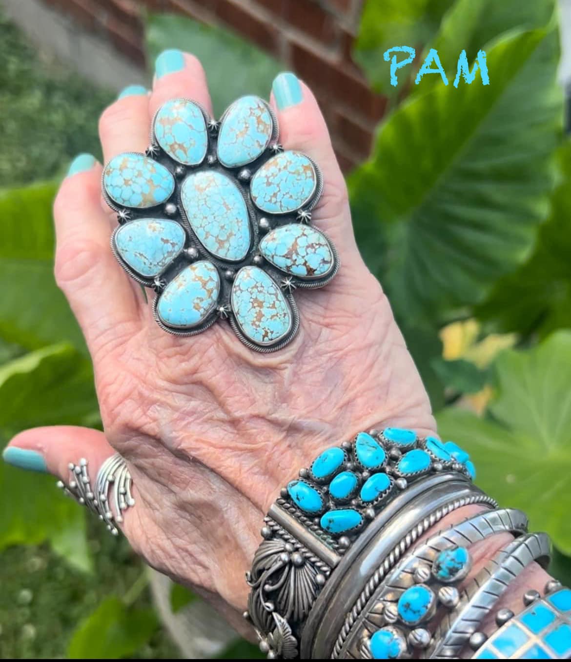 Andy Cadman's handmade Navajo stampwork jewelry with Sleeping