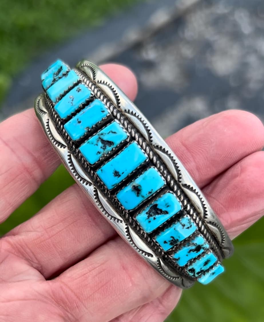 What is the value of a Leo Feeney charm bracelet with Sleeping