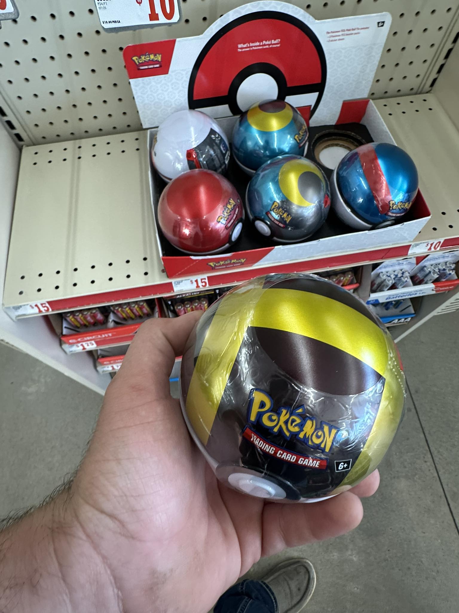 pokemon trading card game poke ball tin family dollar TCG youll find three random Pokemon TCG booster packs (selection varies) Pokemon Poke Ball Tin 2025