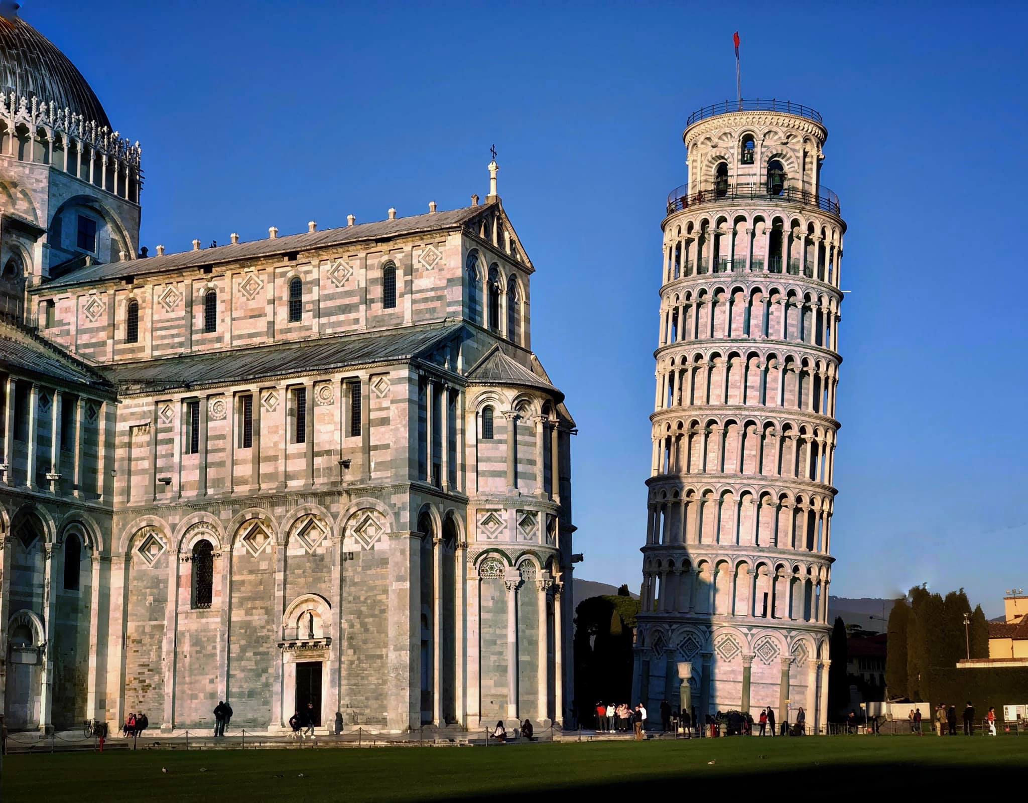 A Tuscan city at dusk with the most famous tower in Italy 