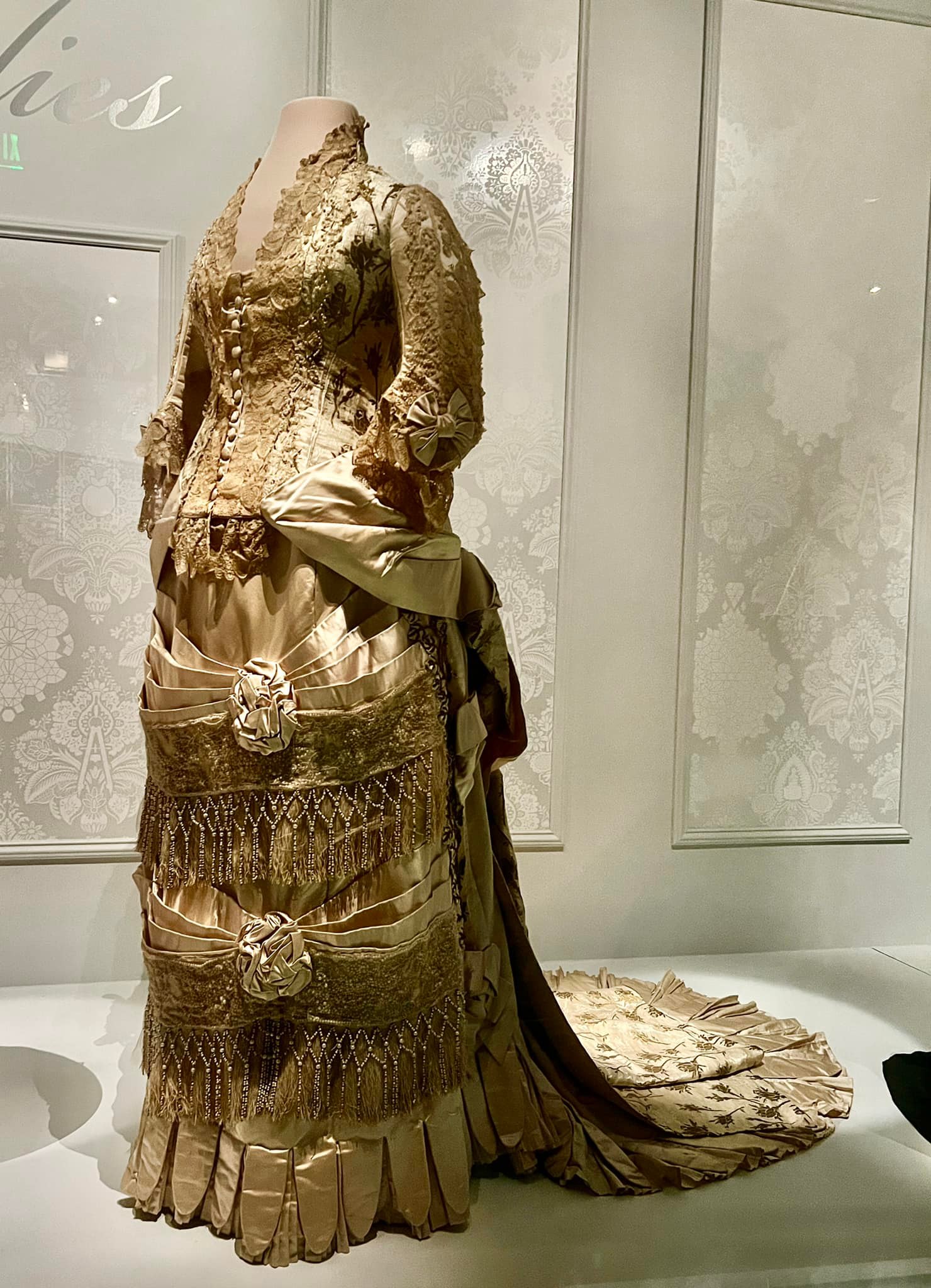 wedding dresses of first ladies Lady Lucy Hayes' blue velvet reception gown on display at Disney World early life wedding laura bush