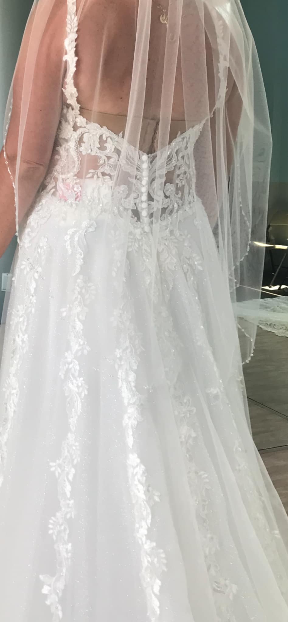 What bra or inserts support large busts in backless wedding dresses?