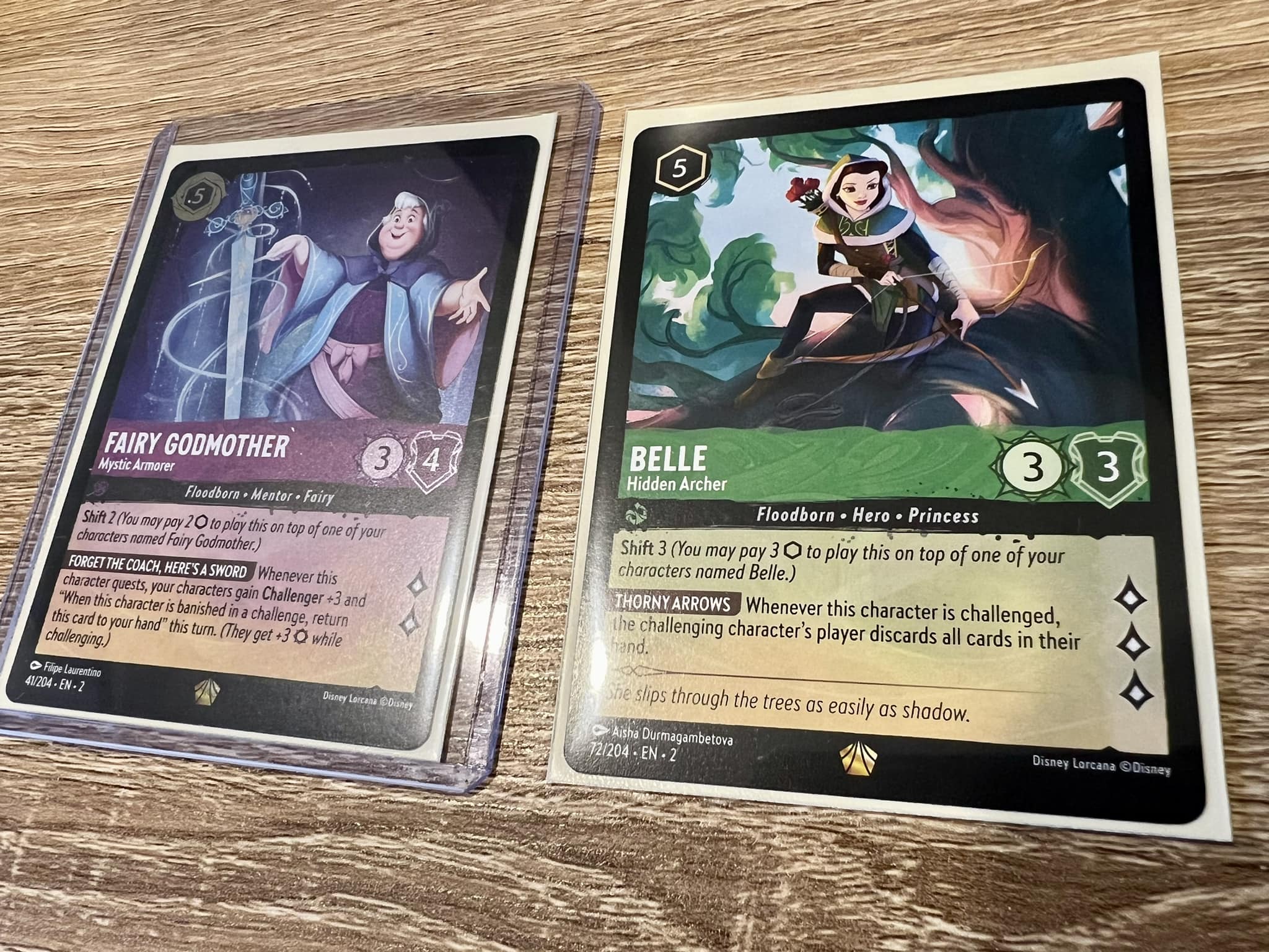 fairy godmother lorcana card 40/204}Fairy Godmother[Foil]  PokeNinJapan (They get +3 Strength while challenging.) Show More var card How to use Fairy Godmother's