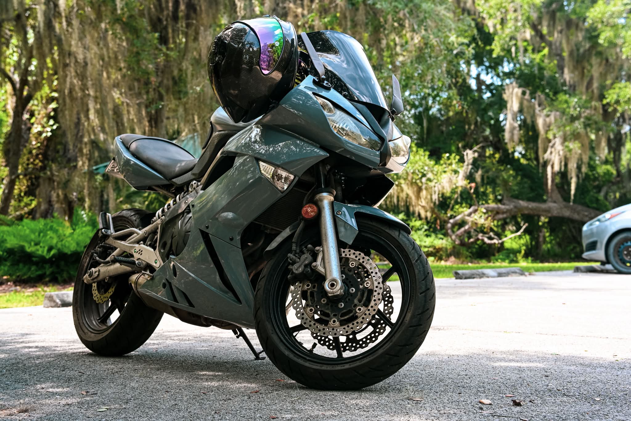 Restored green motorcycle back on the road after years in storage