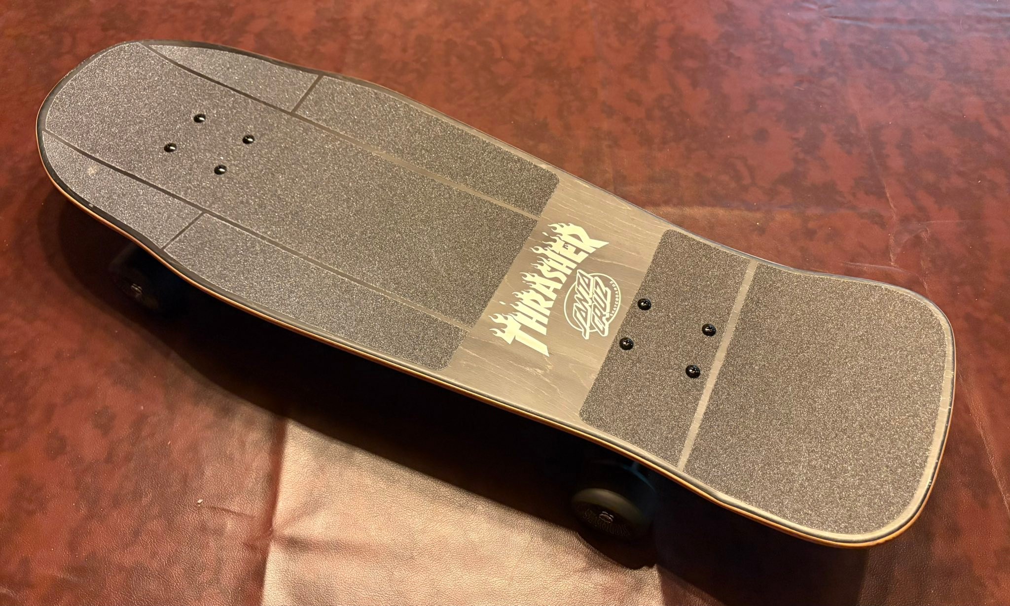 Vintage skateboard setup with Indy Stage IV trucks and Santa Cruz 