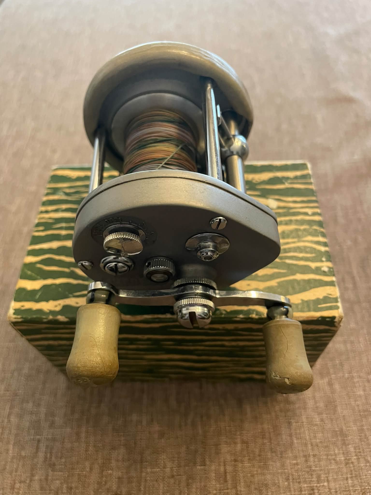 Pflueger Supreme 1573 reel with original braid and box