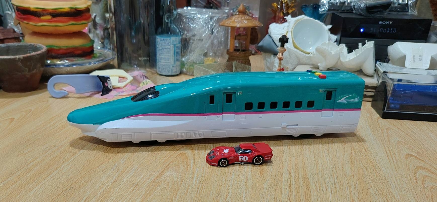 2026 Mattel '76 Greenwood Corvette toy with Shinkansen E5 train