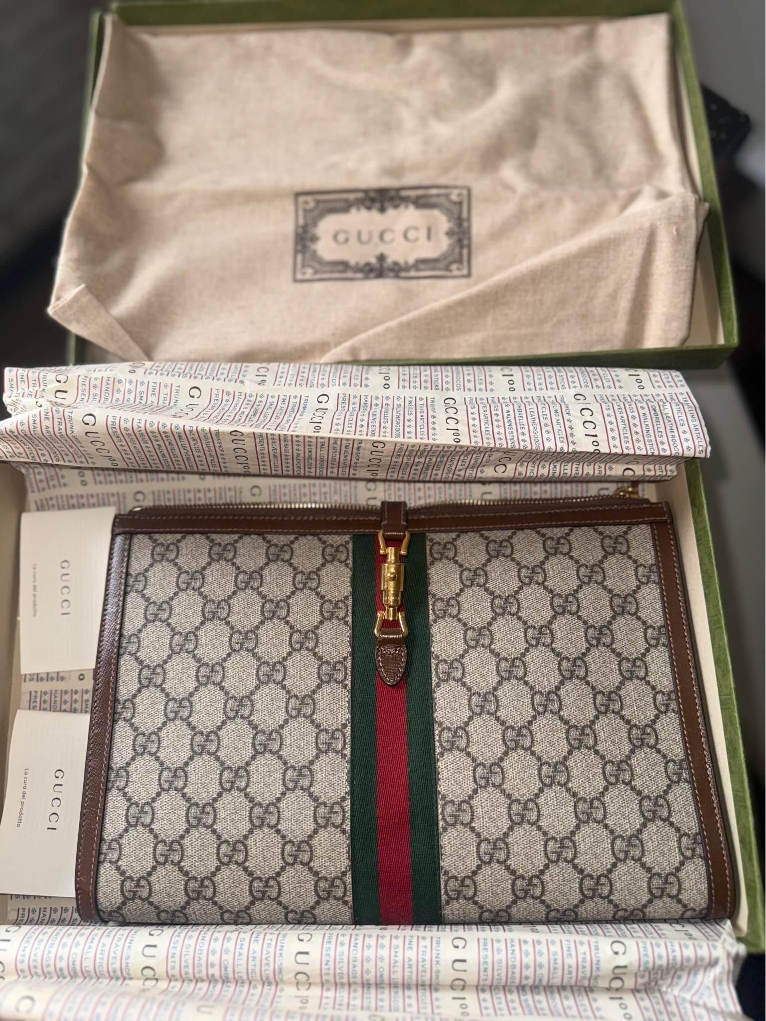 Brand new in box with receipt from Gucci originally $890