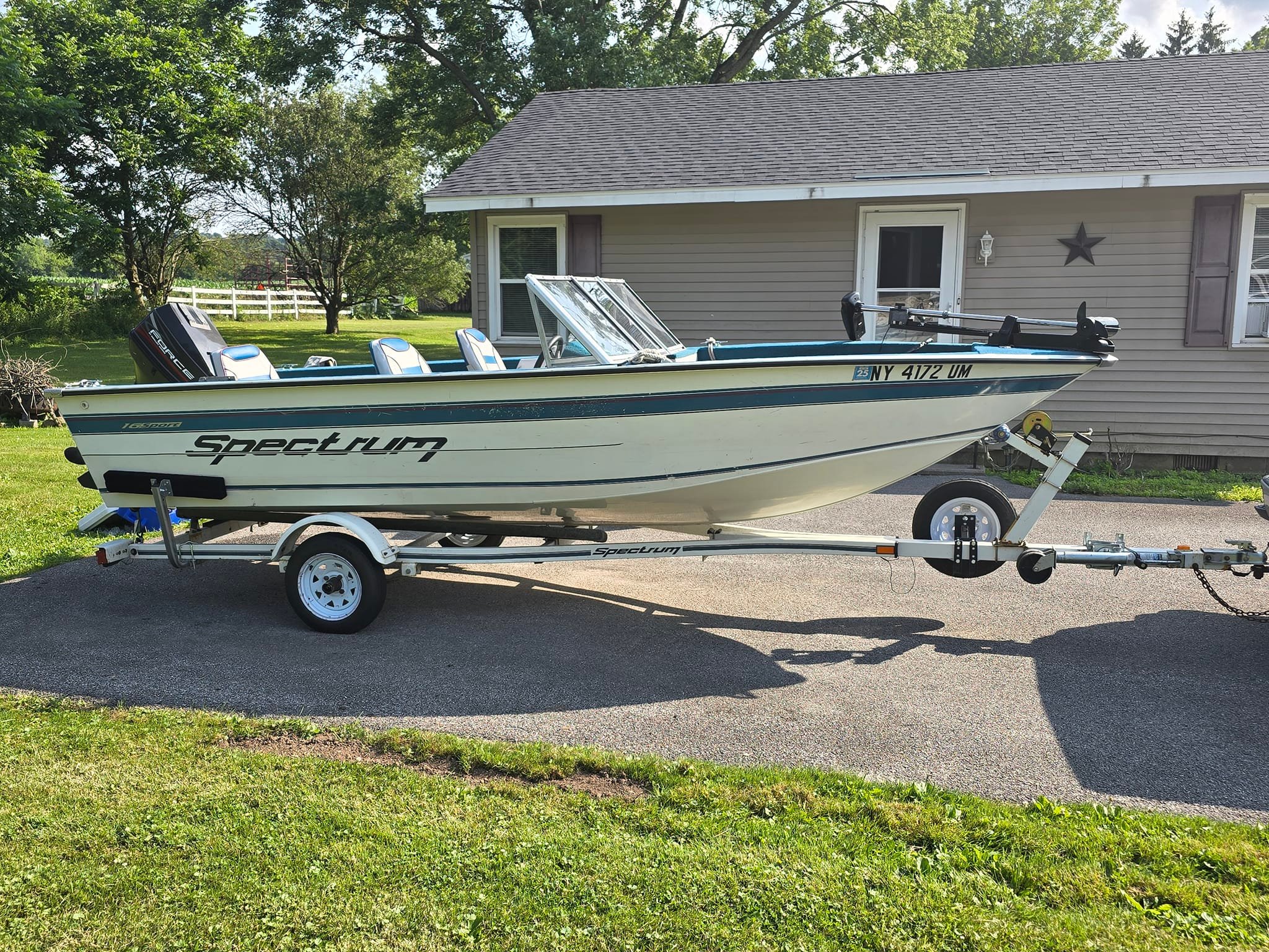 How does the Spectrum 19 ft boat with Mercruiser motor handle?
