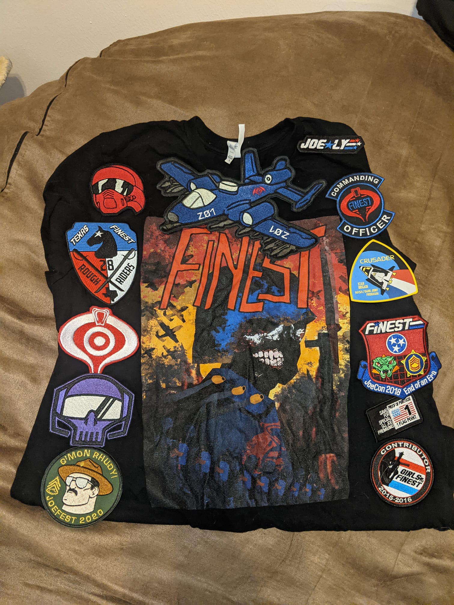 Battle vest with concert patches from bands seen since 2024