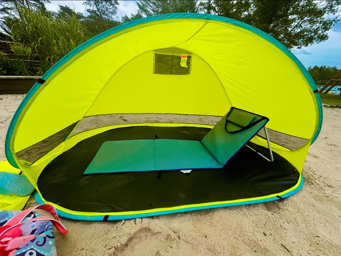 AOS pop up tent and beach chair for sun-sensitive couples