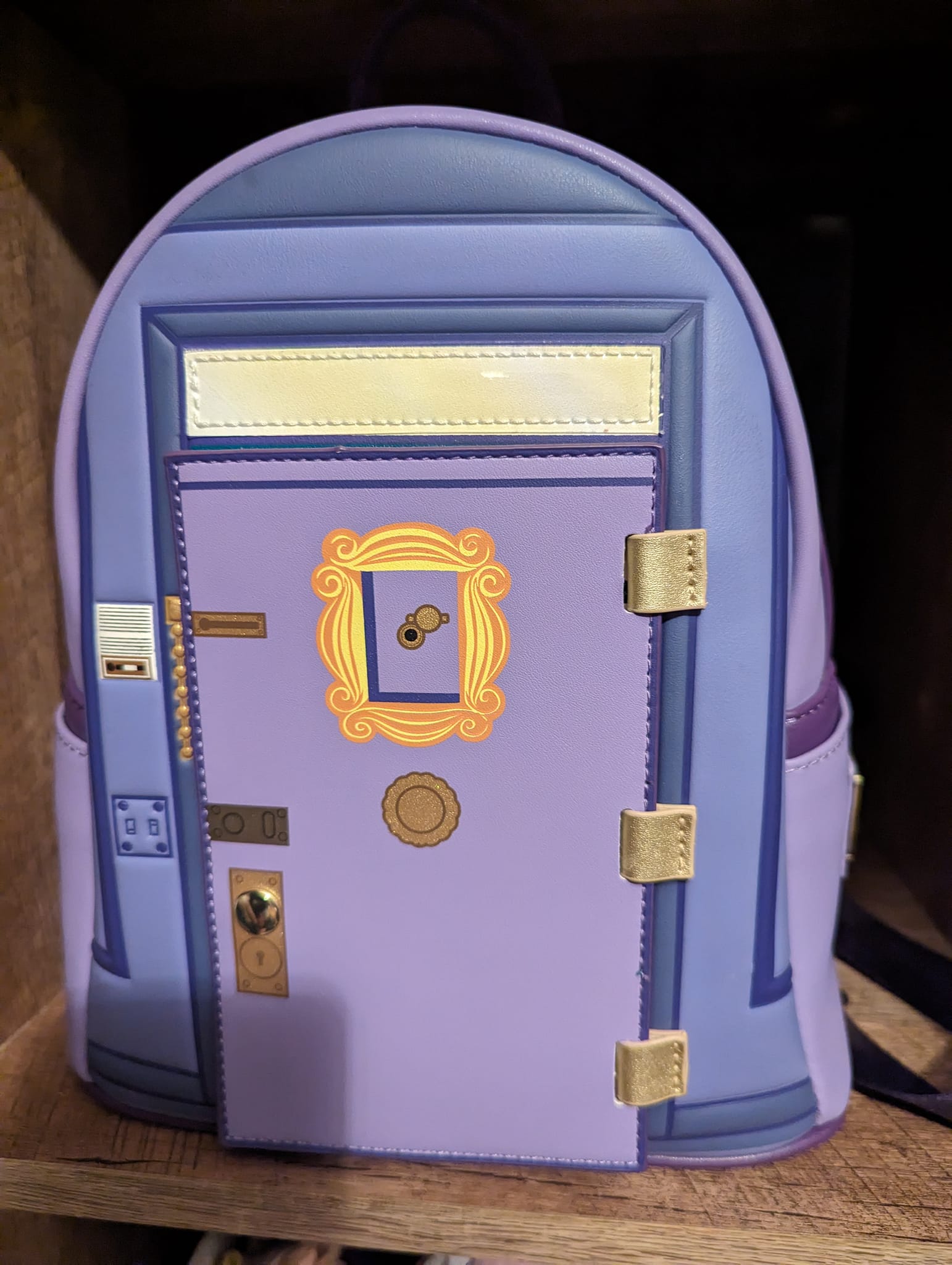 friends pin collector mini backpack Loungefly Front Door It is made of faux leather and features a top zipper closure Loungefly Mint Pin Trader Faux-Leather