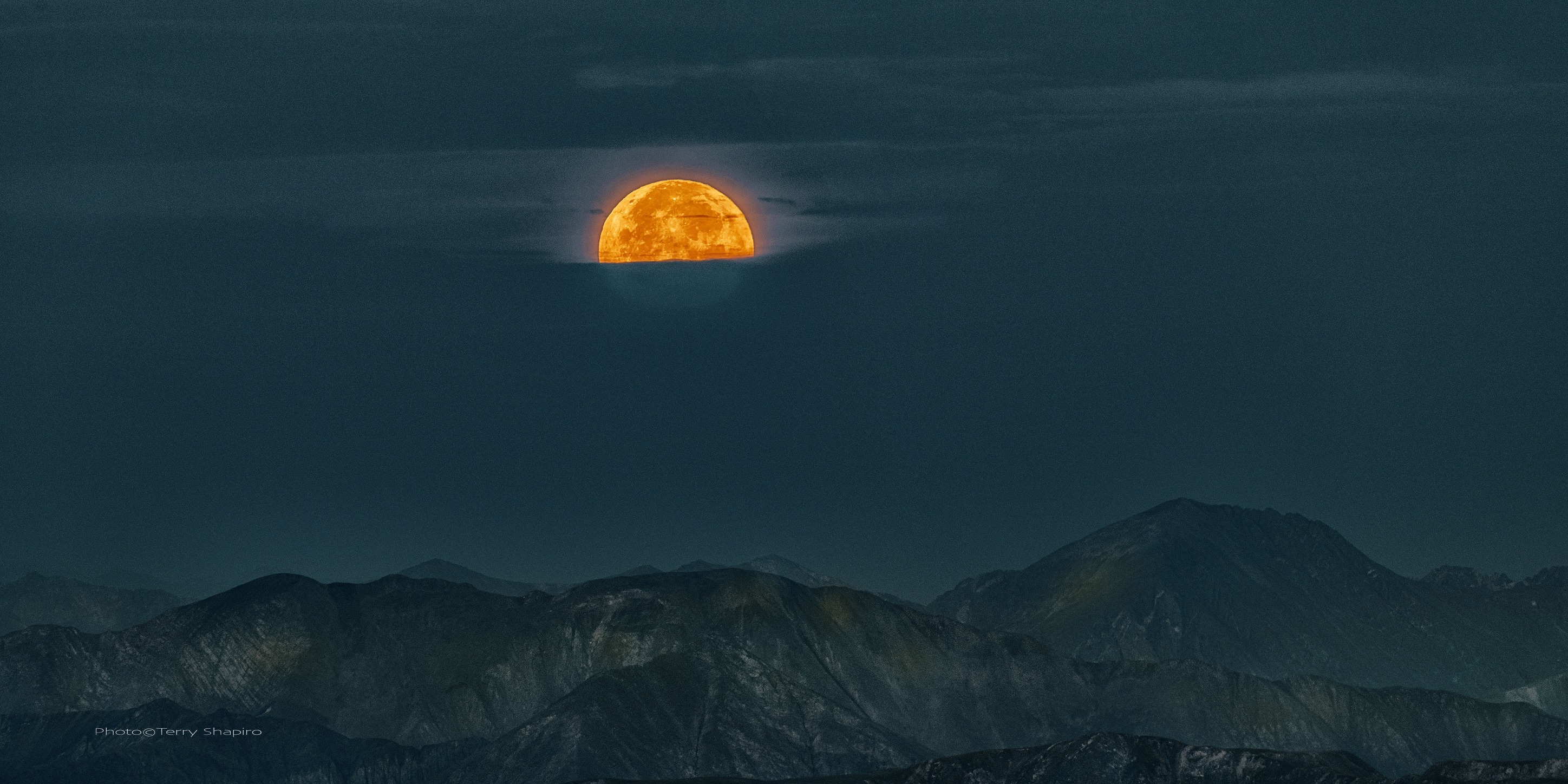 【R&B】 MAUTI - Full Moon Full moon setting behind clouds on Mt Blue Sky, Colorado