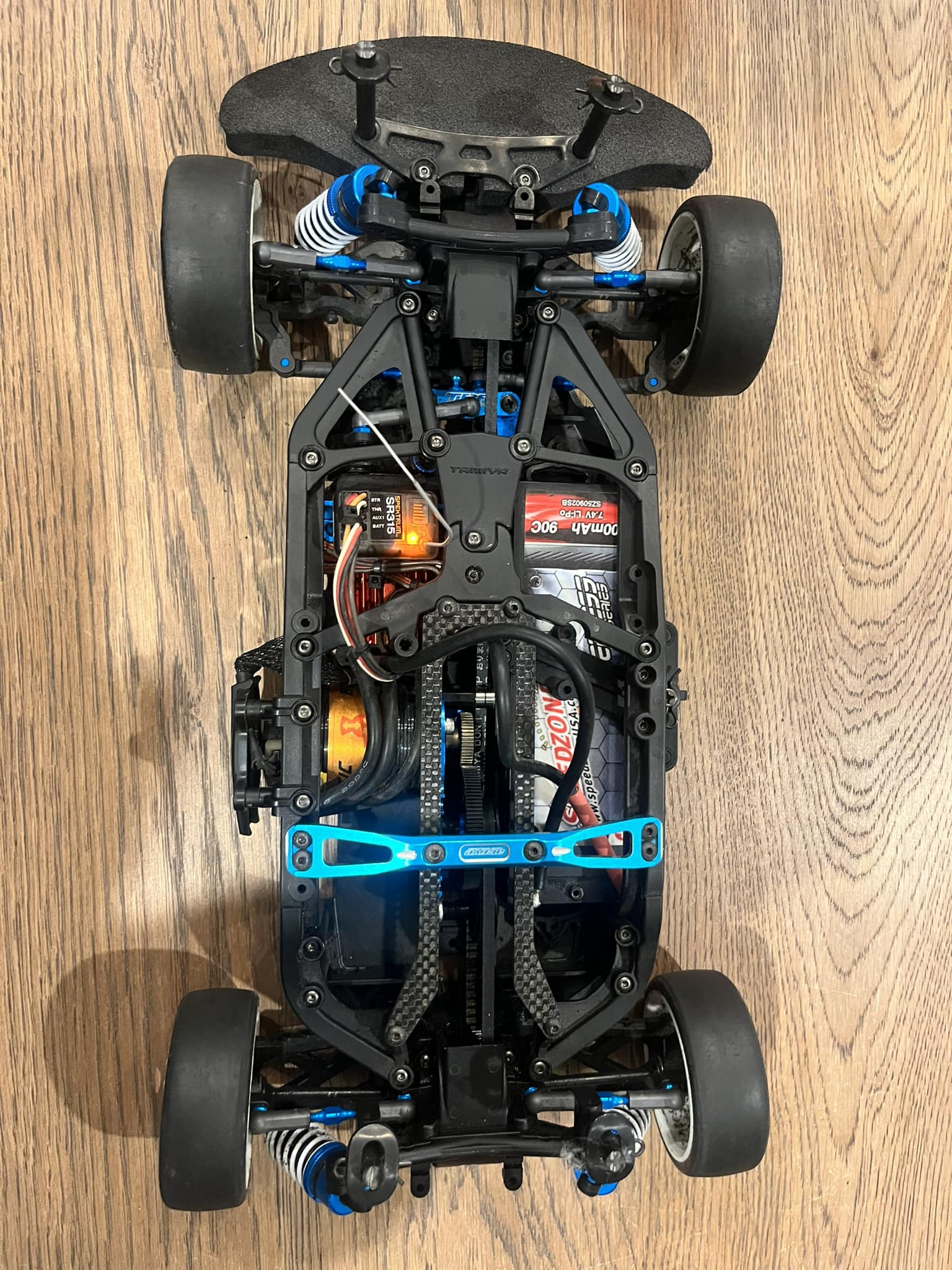 How to get more traction on cornering with Tamiya TA07 Pro on asphalt?