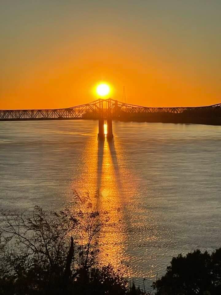 Mississippi River bridge sunset in Natchez, MS