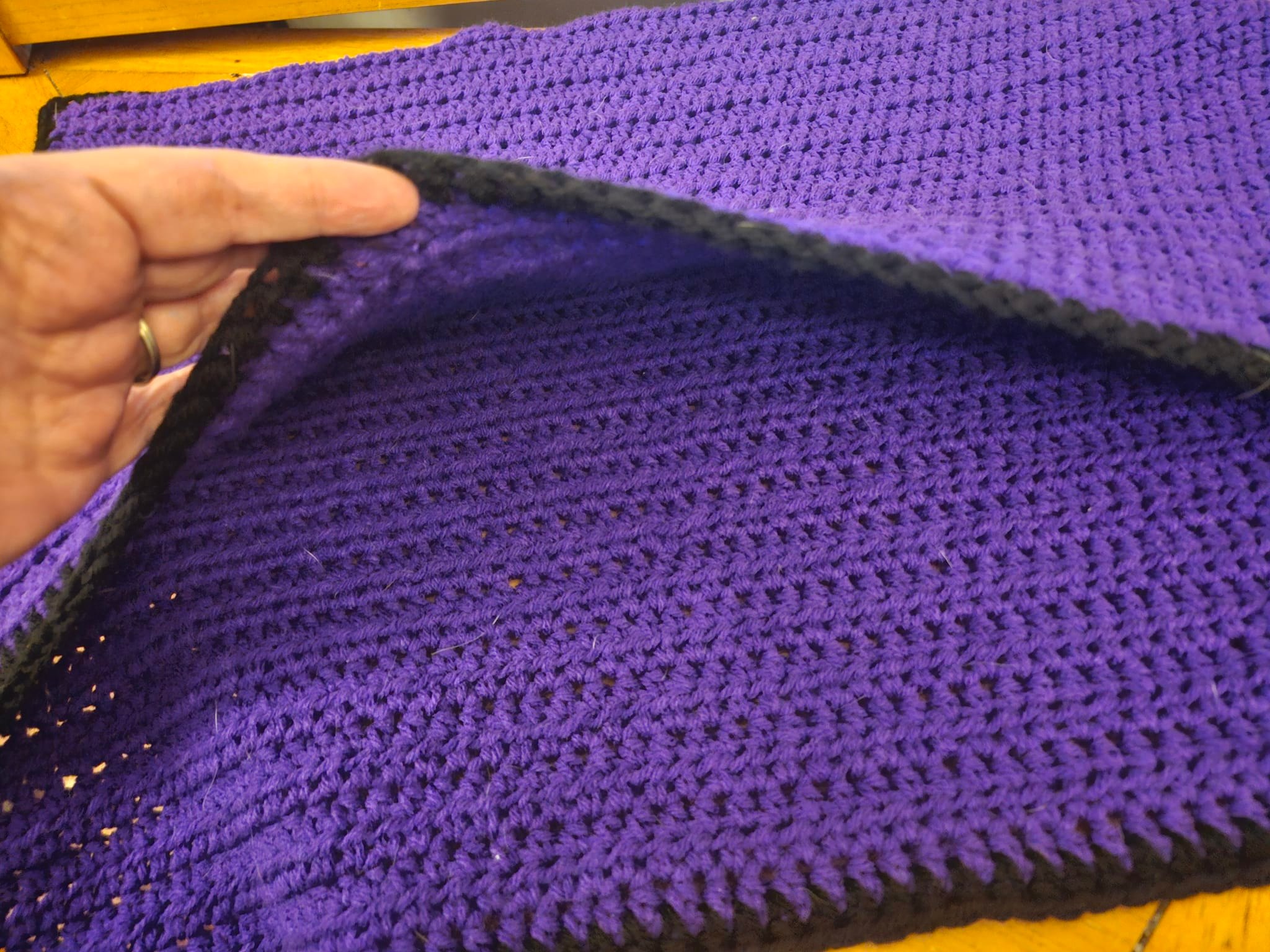 Handmade kitty pouch with amethyst yarn