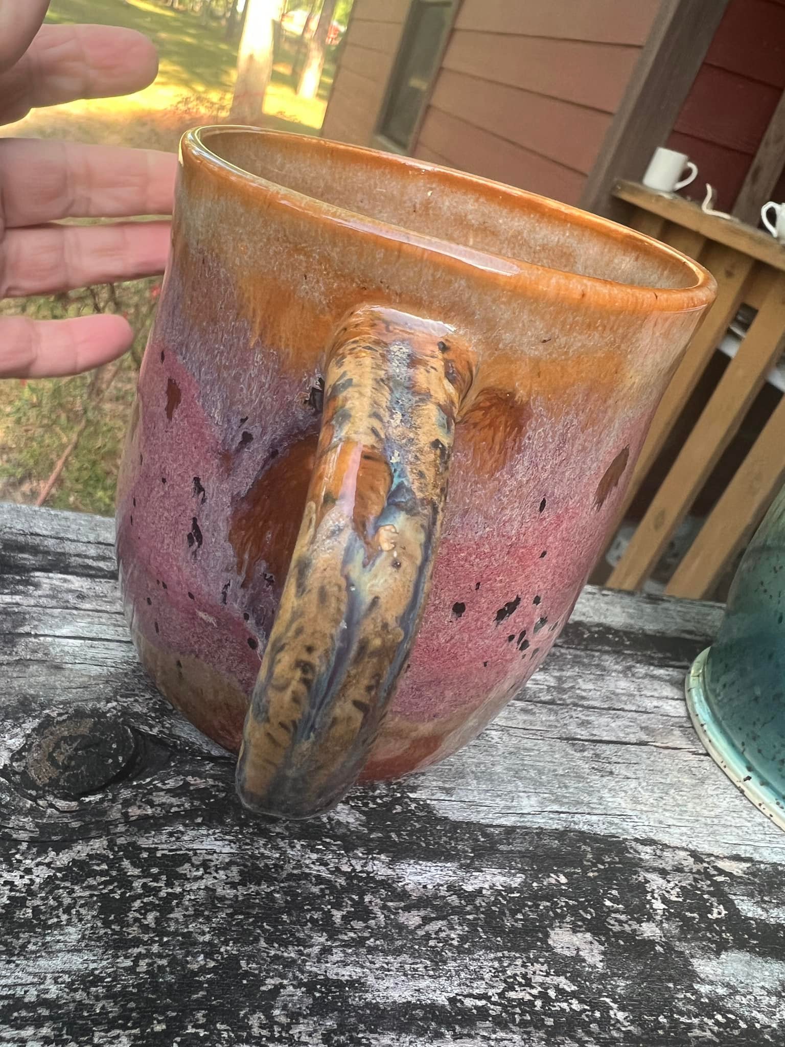Ceramic mugs with bougainvillea and kimchi designs on Iceman clay